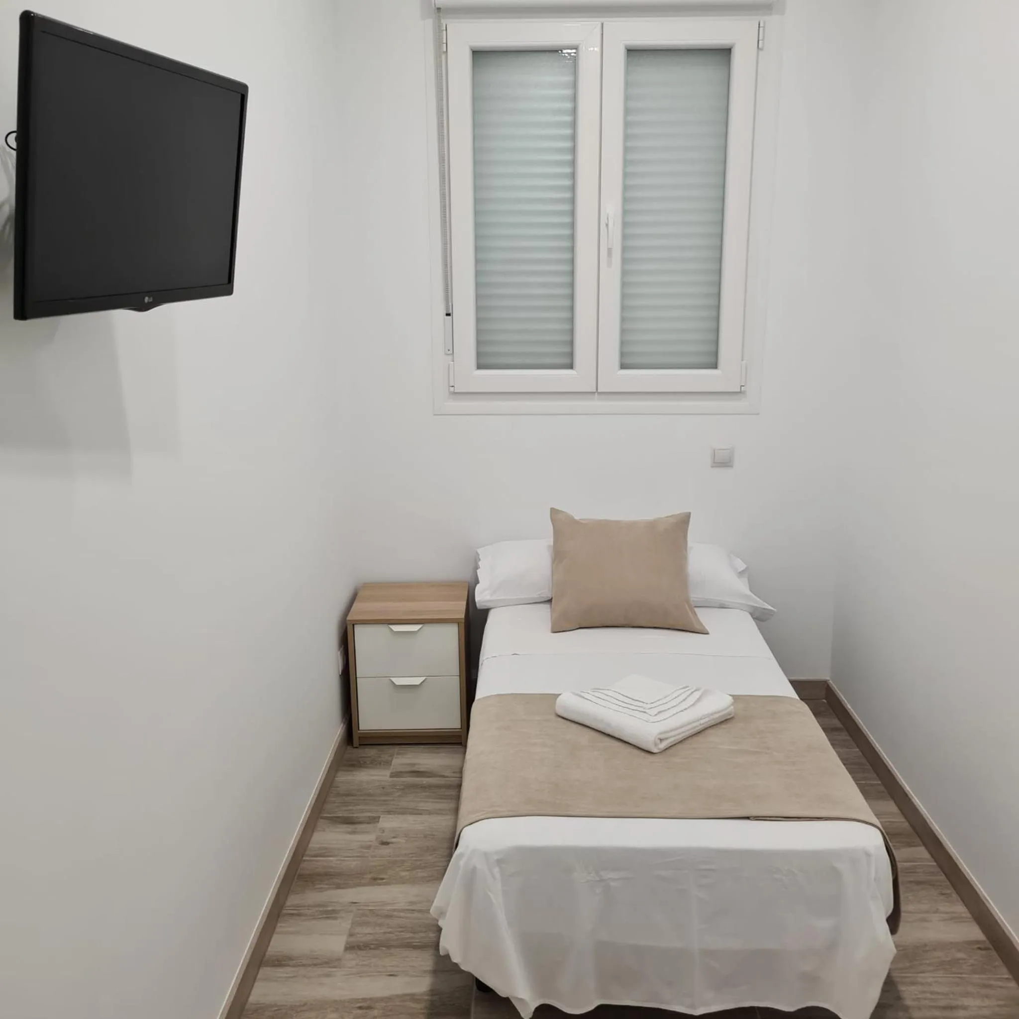 Bed in Hostal Las Fronteras