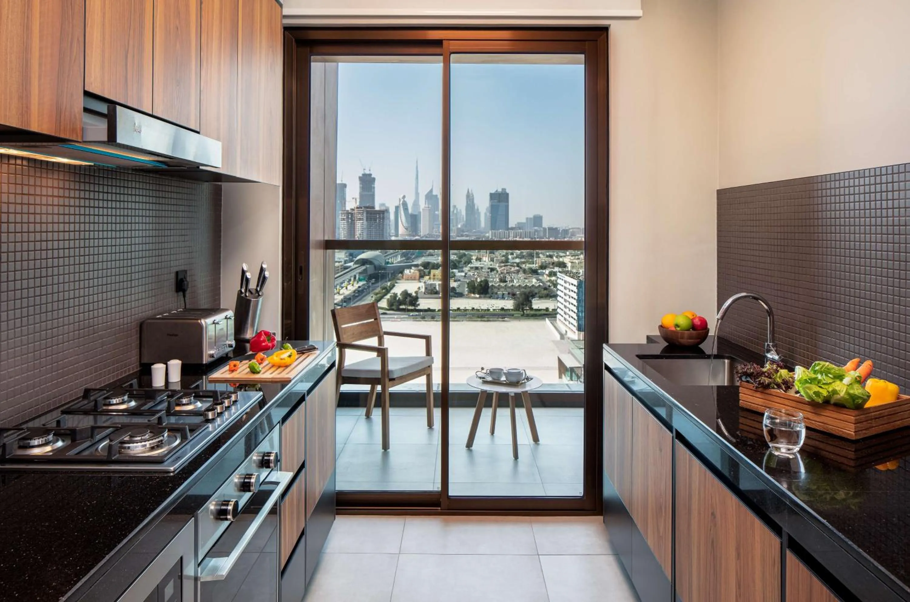 Kitchen or kitchenette in DoubleTree by Hilton Dubai M Square Hotel & Residences