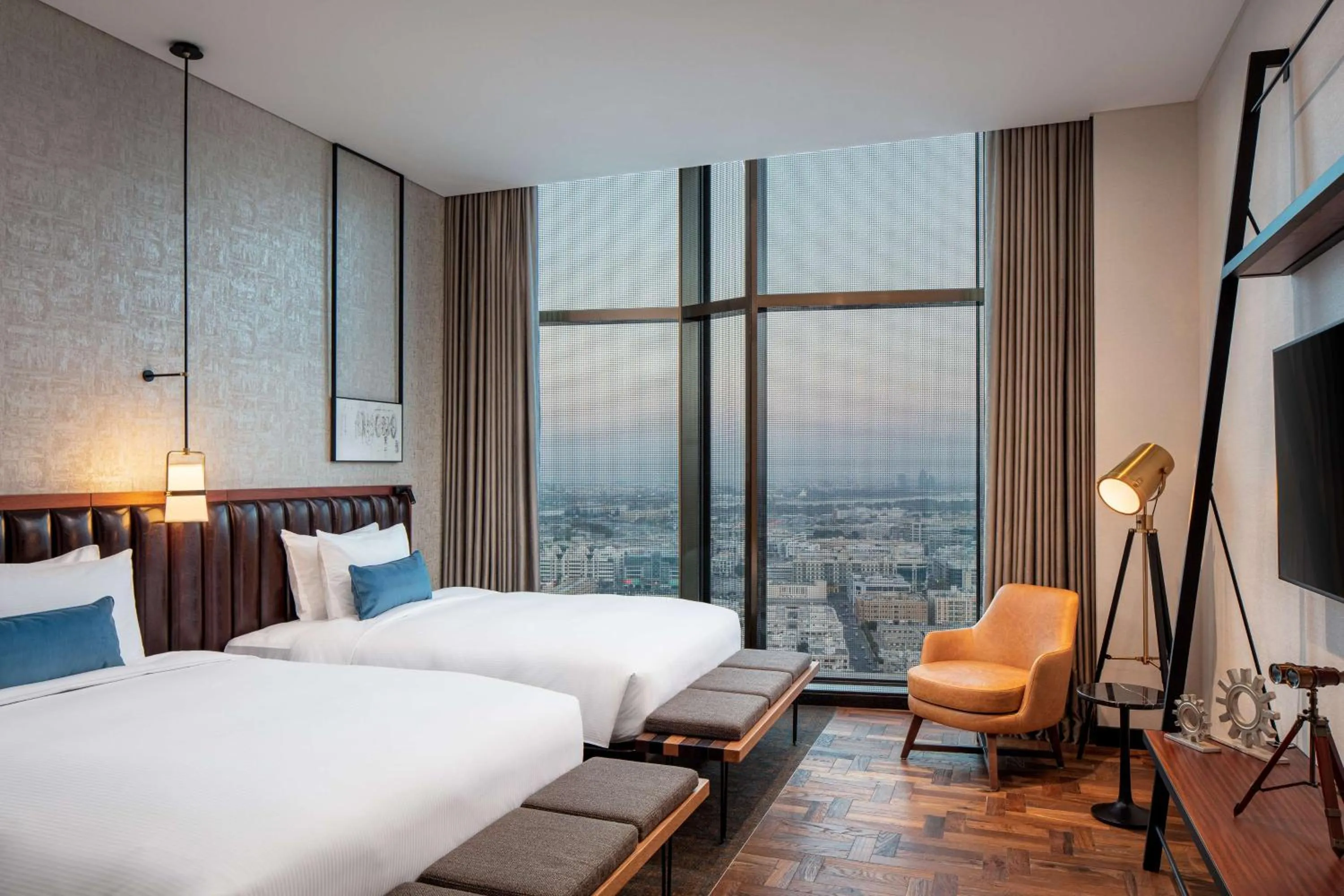 Living room, Bed in DoubleTree by Hilton Dubai M Square Hotel & Residences