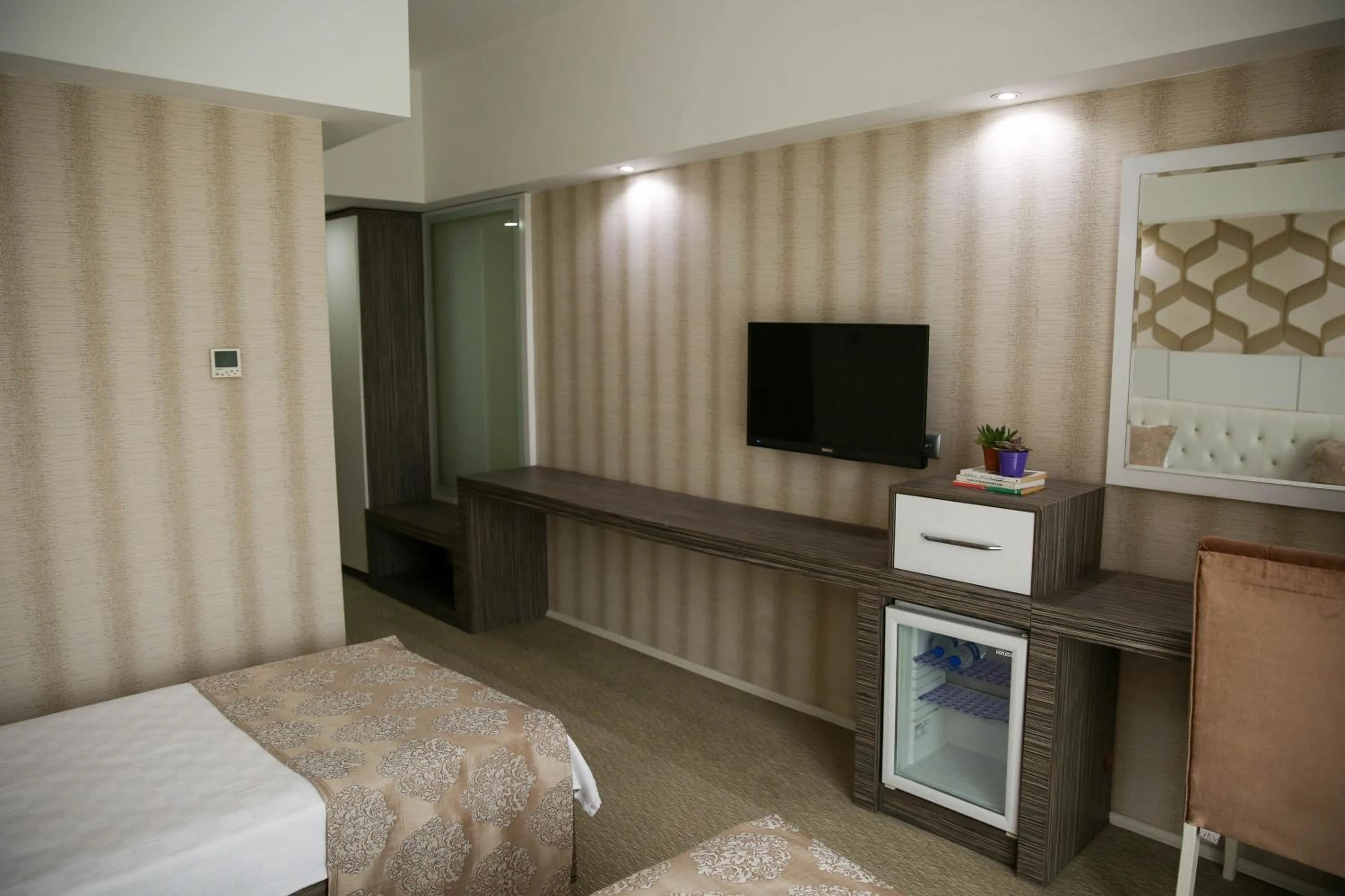 Bed in MOX Hotel Wellness & Spa