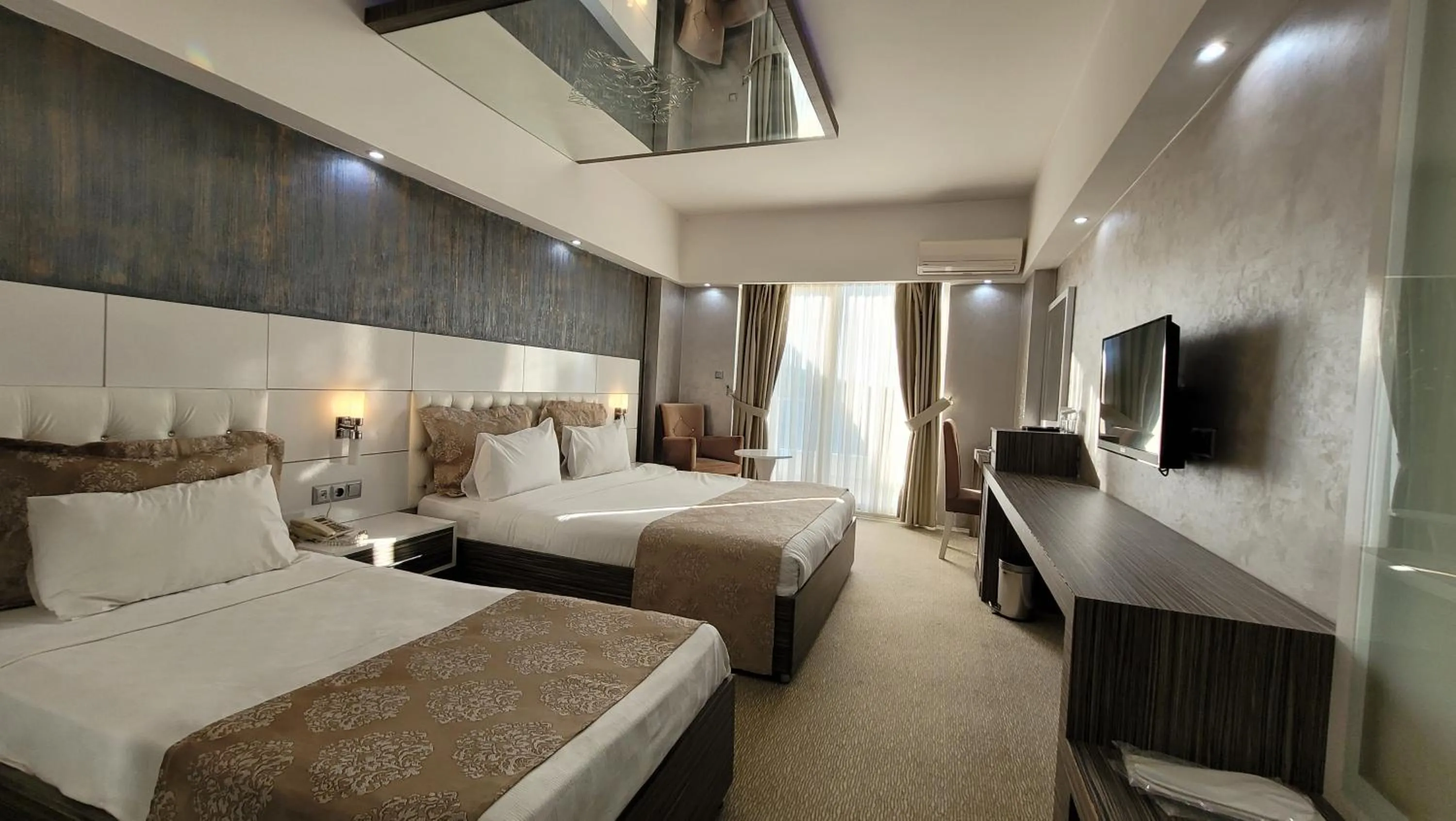 Bed in MOX Hotel Wellness & Spa