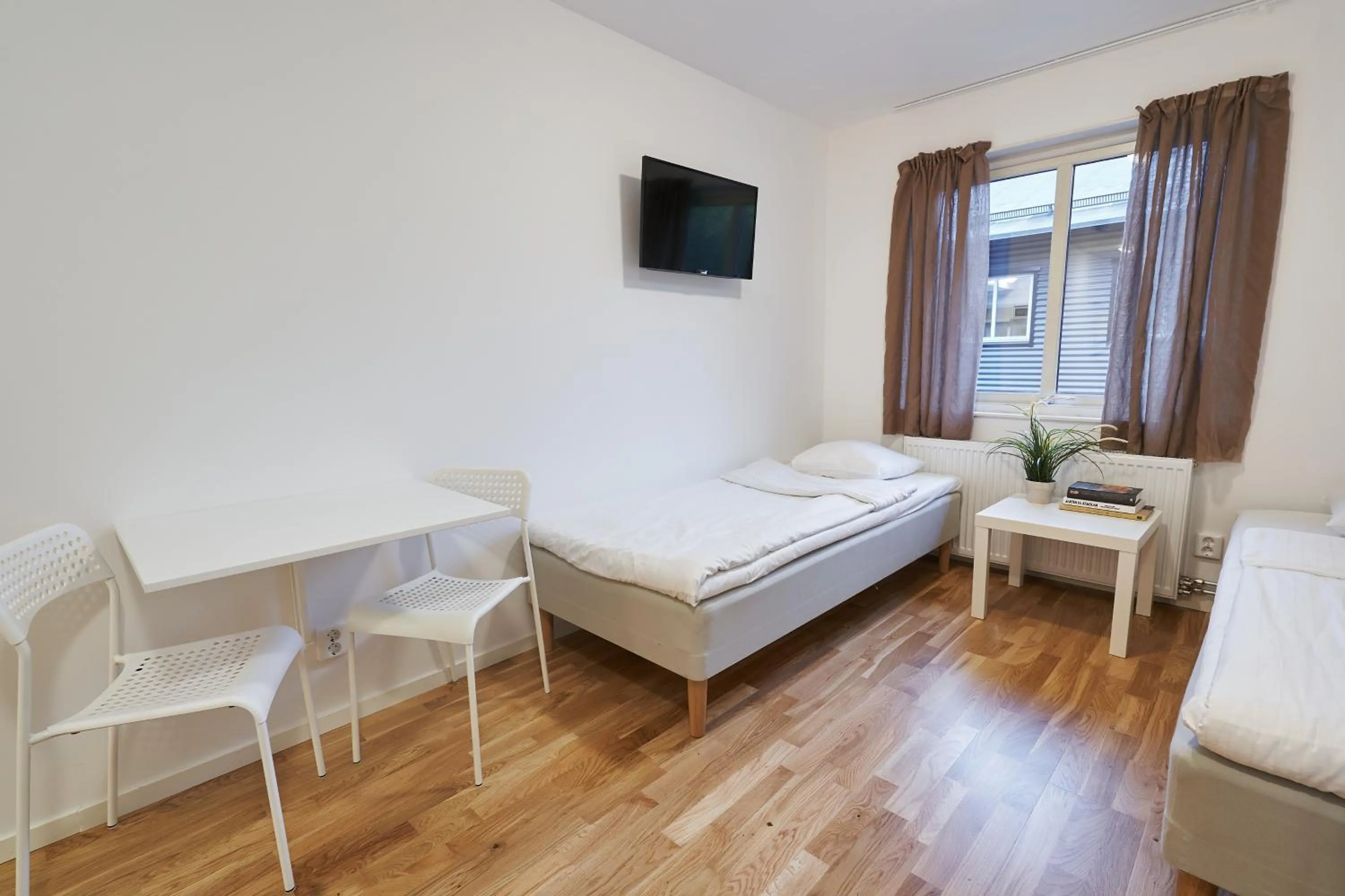 Bed in Bålsta Apartment Hotel