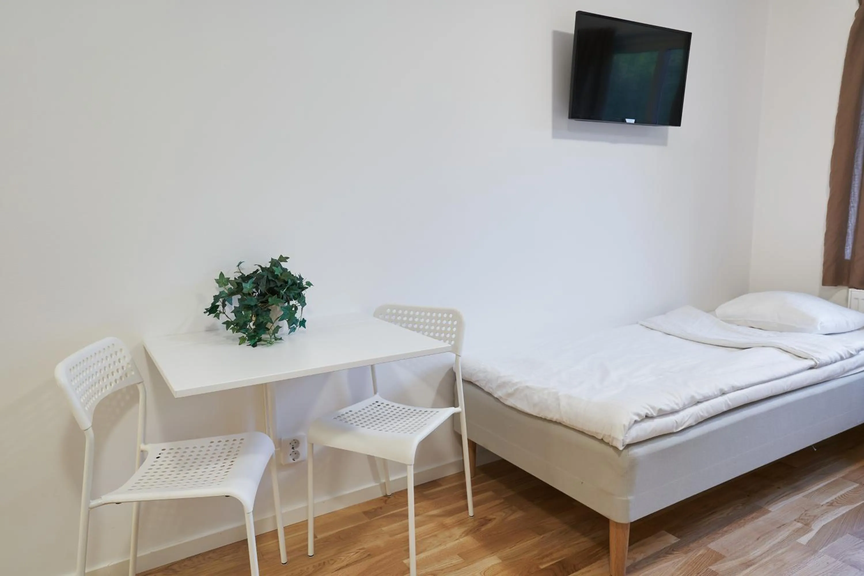 Bed in Bålsta Apartment Hotel