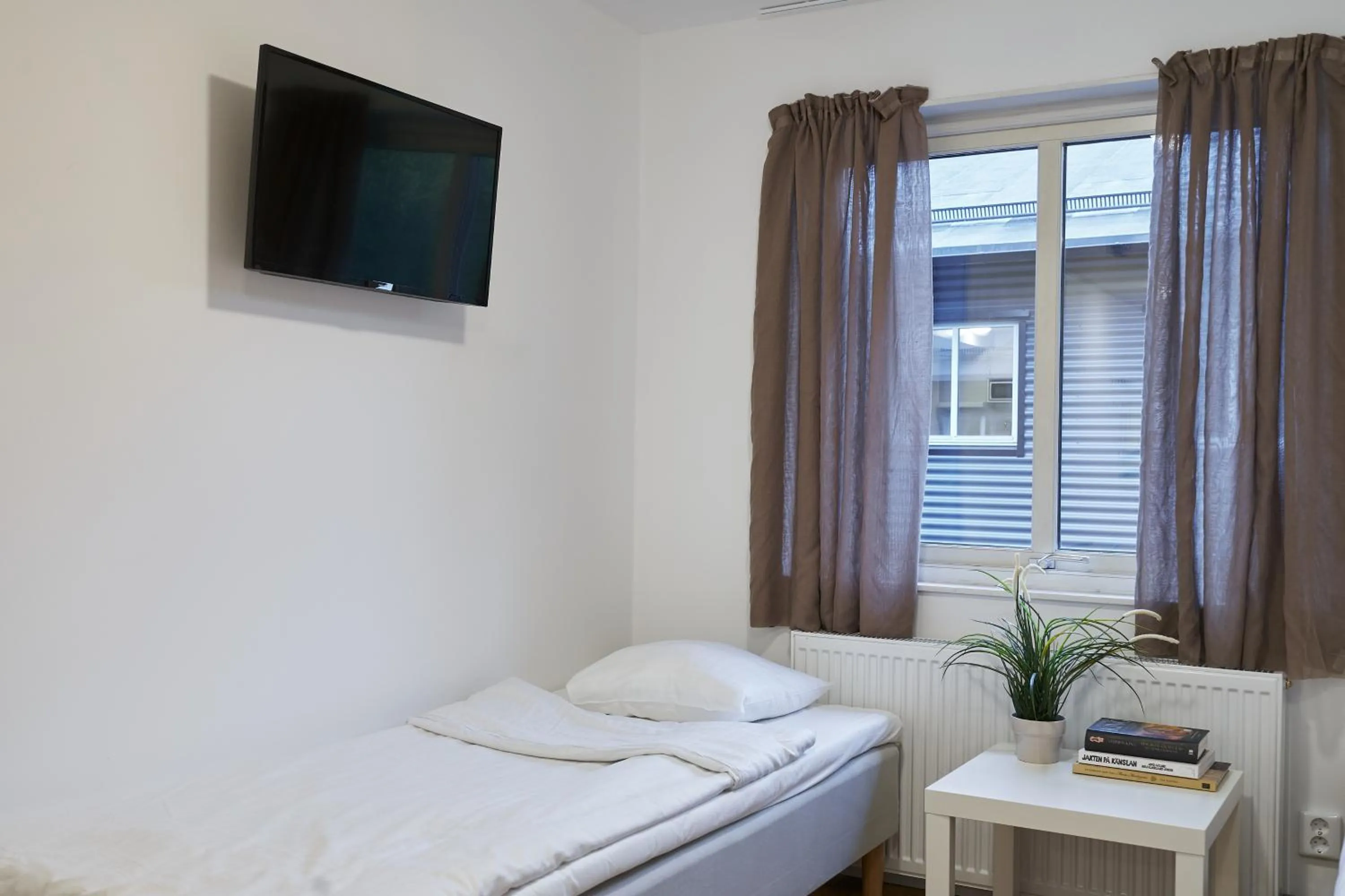 Bed in Bålsta Apartment Hotel