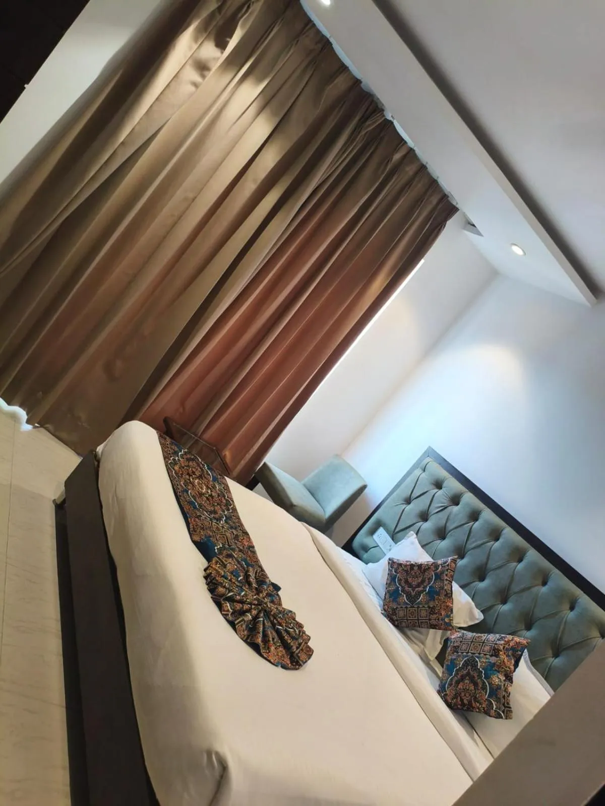 Bedroom, Bed in Luxe Stayz Avi Inn