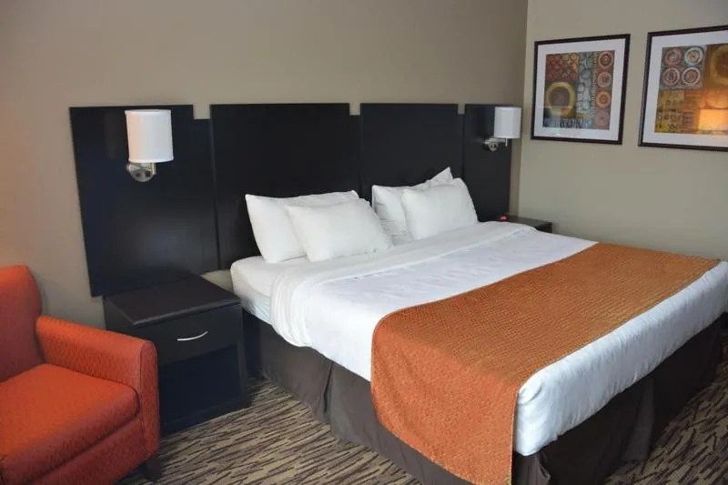 Bed in Roosevelt Inn & Suites