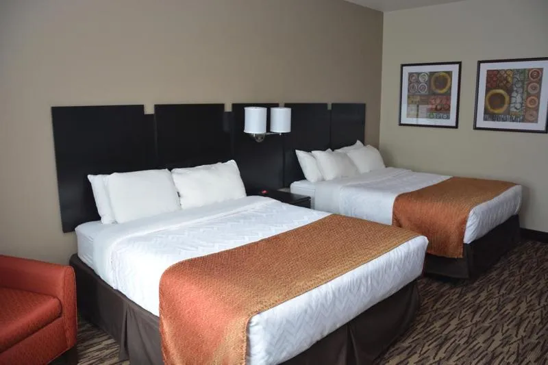 Bed in Roosevelt Inn & Suites