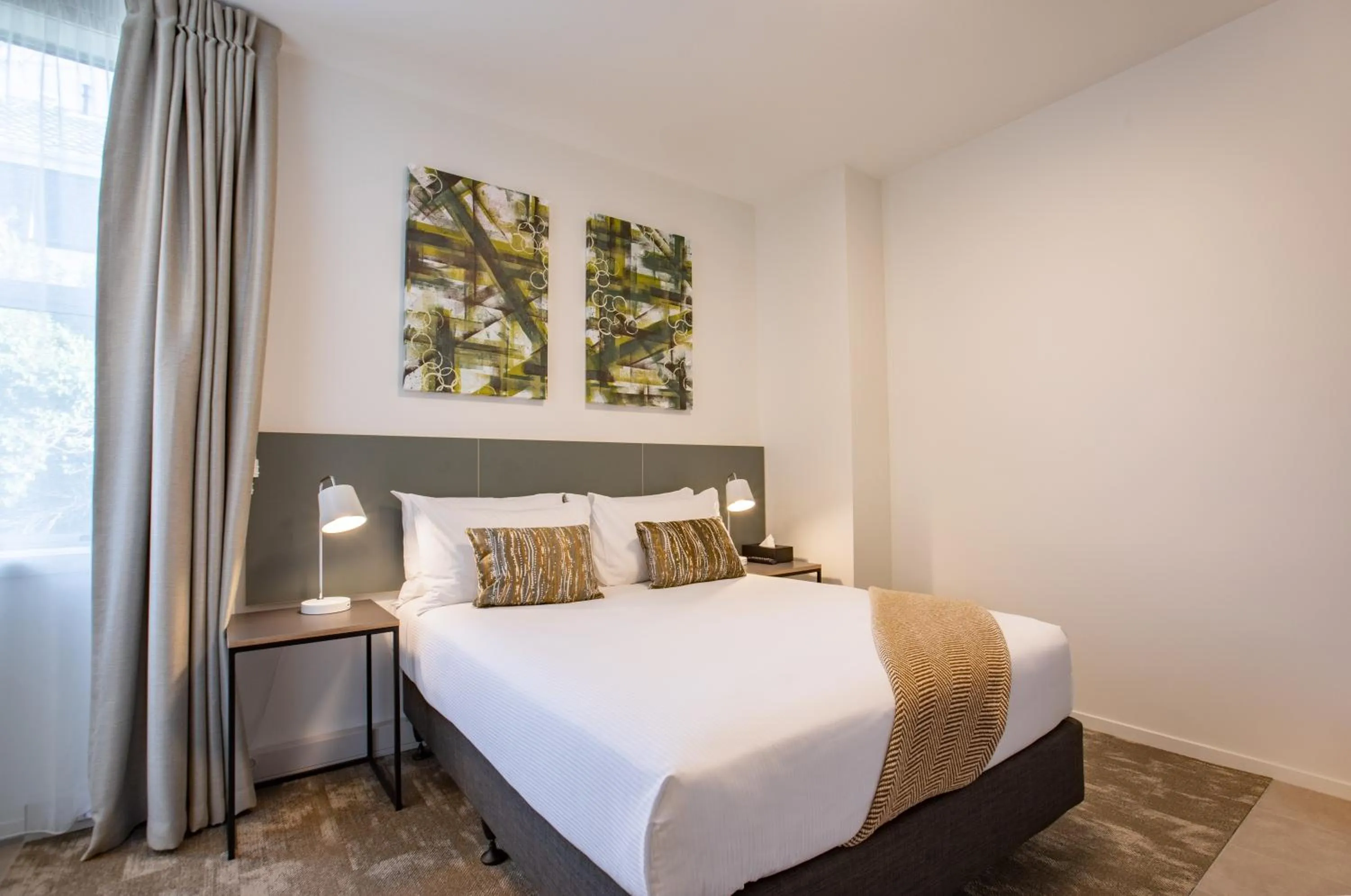 Bed in Sojourn Apartment Hotel - Riddiford