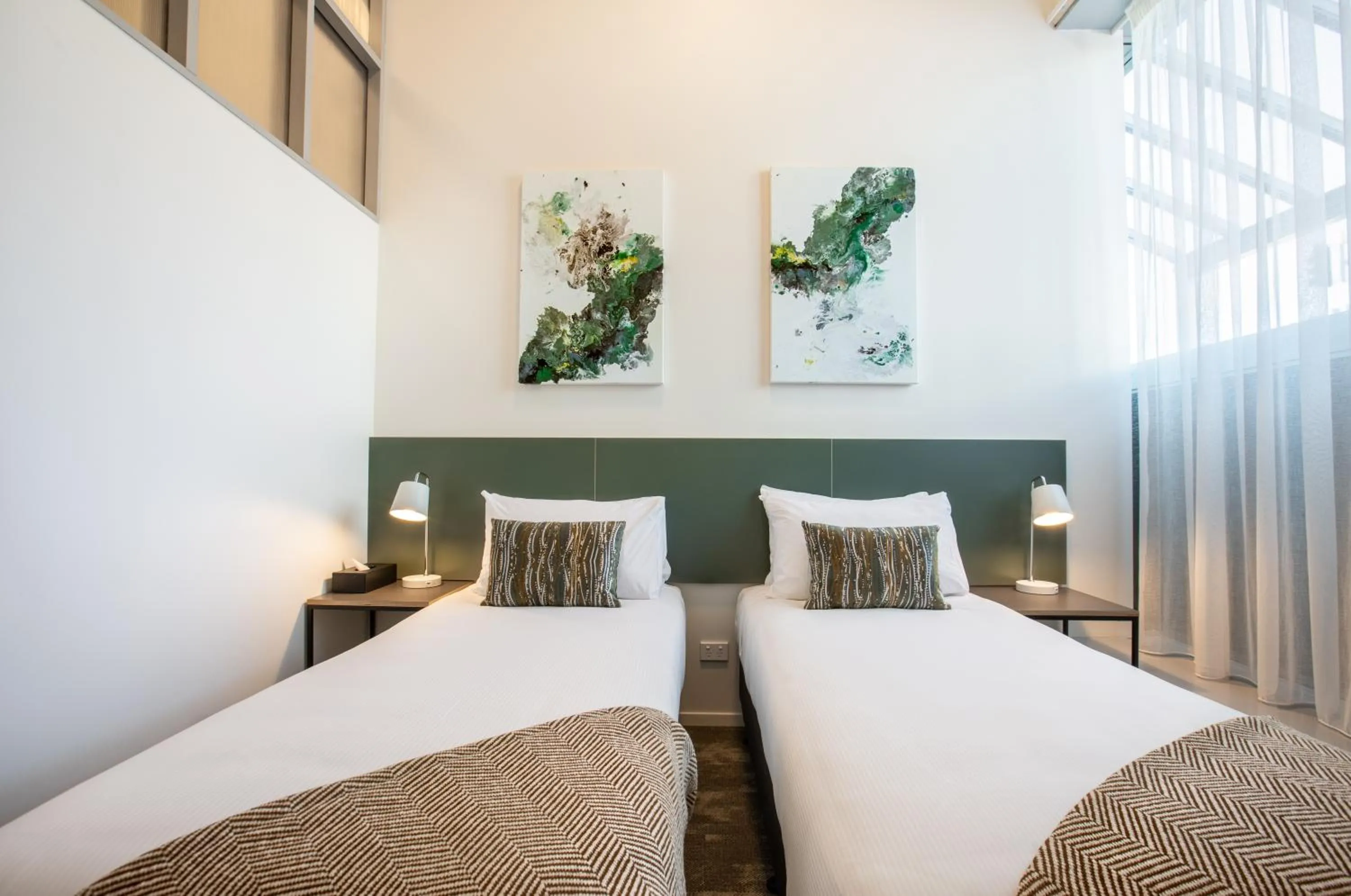 Bed in Sojourn Apartment Hotel - Riddiford