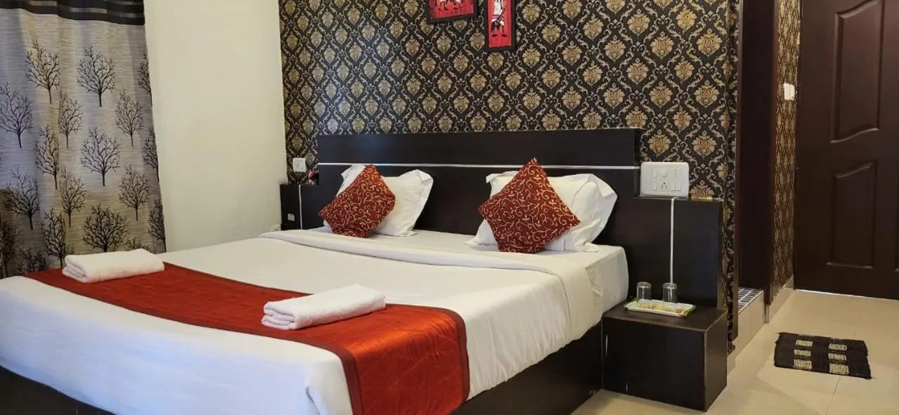 Bed in Green Trees Munnar