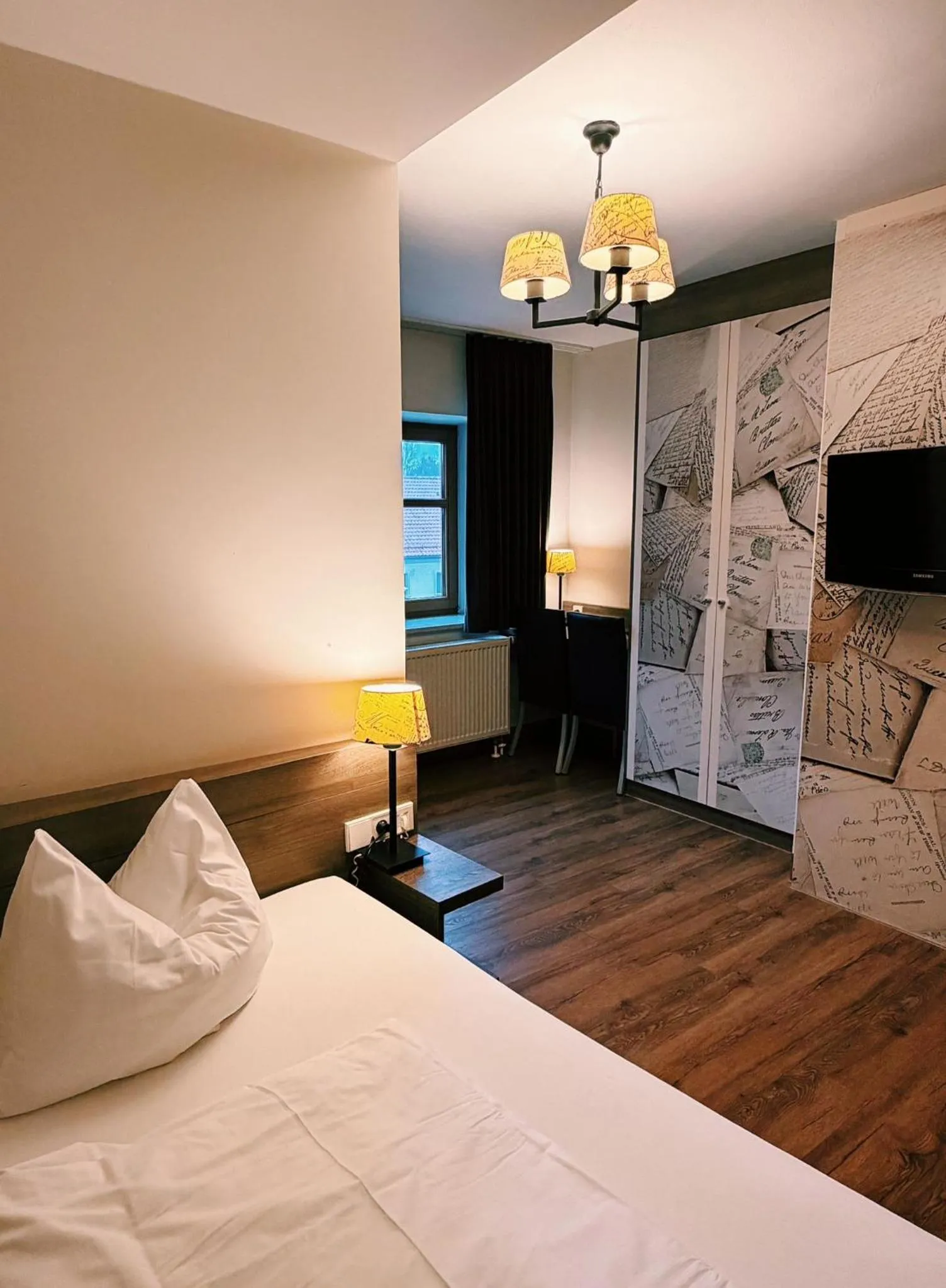 Photo of the whole room, Bed in Posthotel Walhalla Regensburg Ost