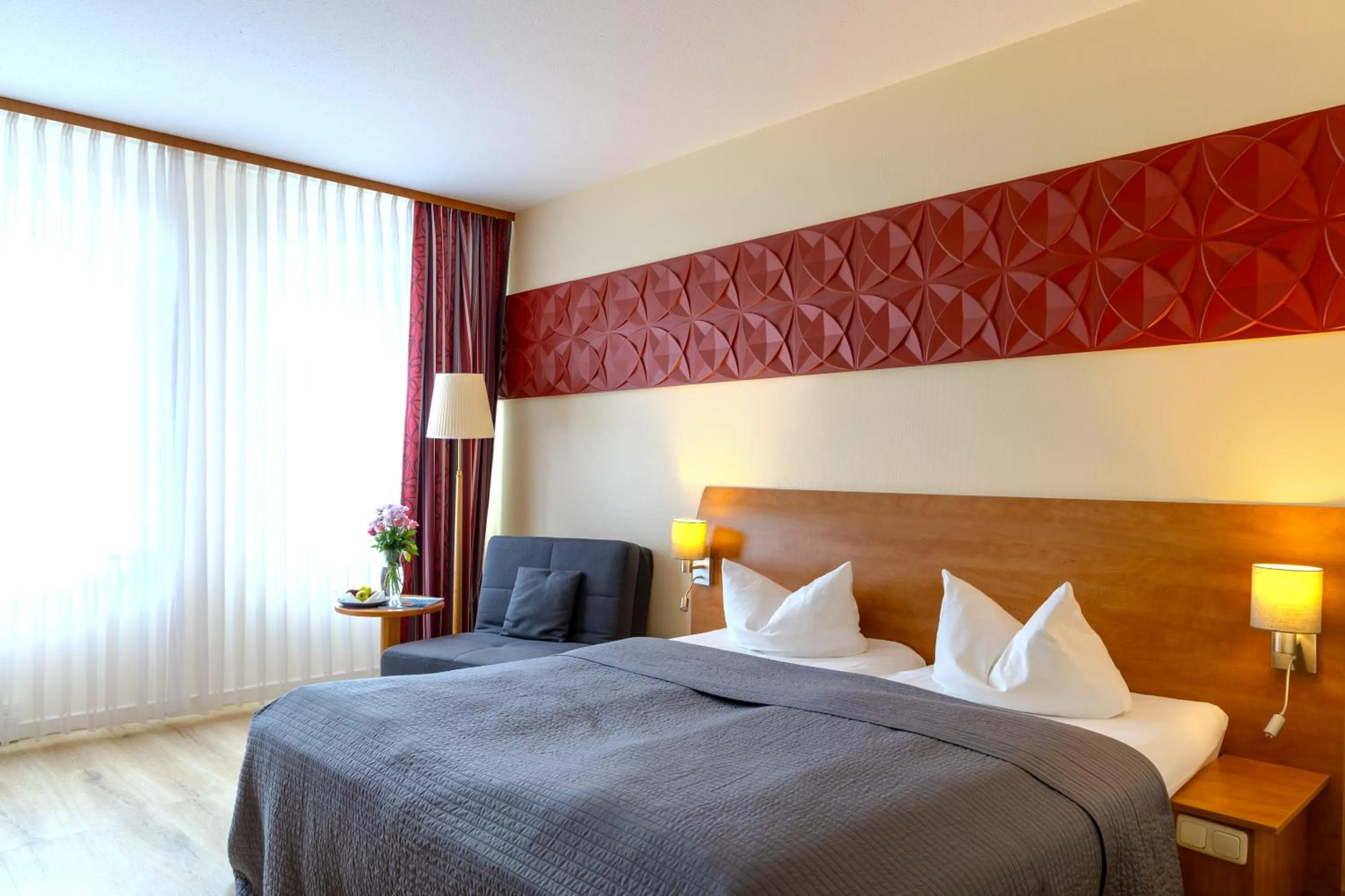Photo of the whole room, Bed in Hotel Mercator Itzehoe-Klosterforst