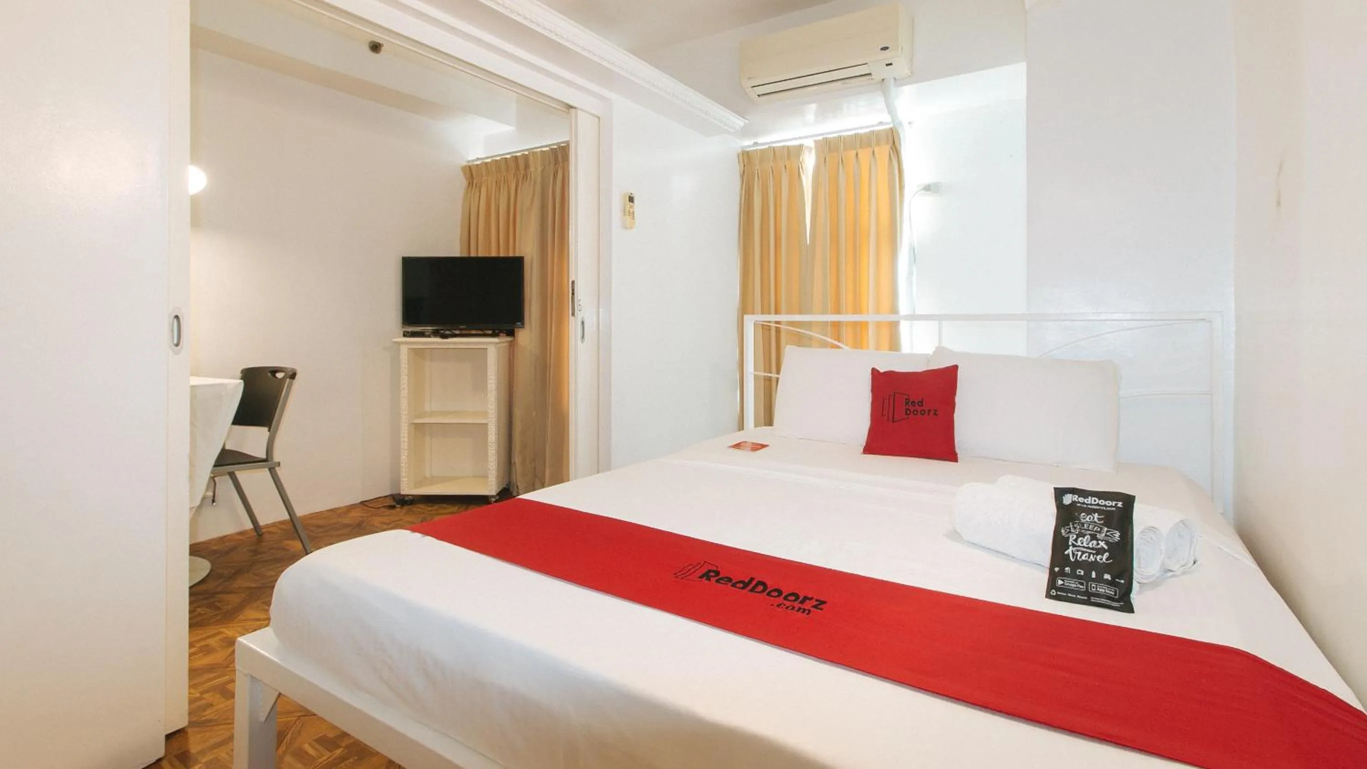 Bed in RedDoorz at The Providence Tower