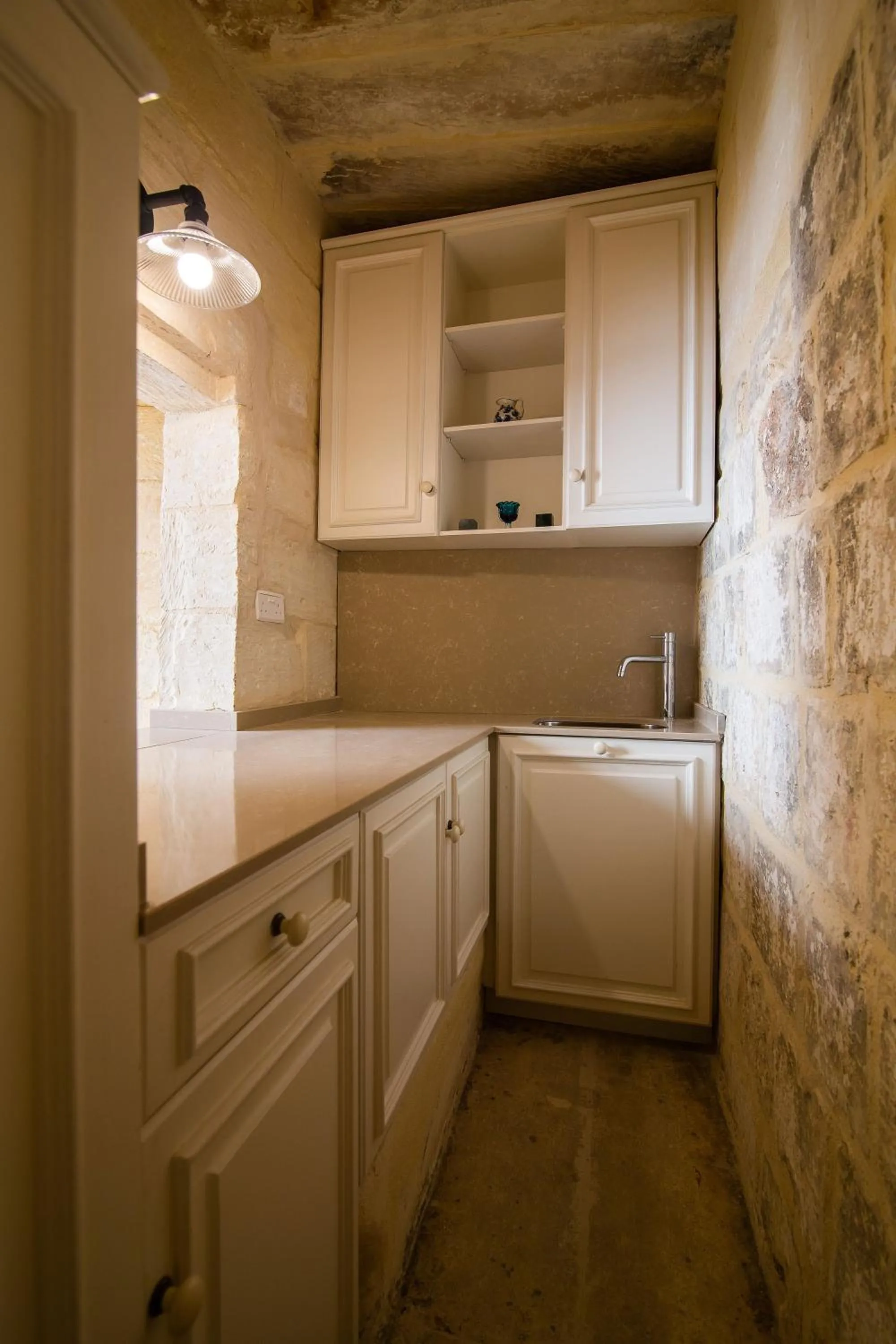 Kitchen or kitchenette in Palazzino Birgu Host Family Bed and Breakfast