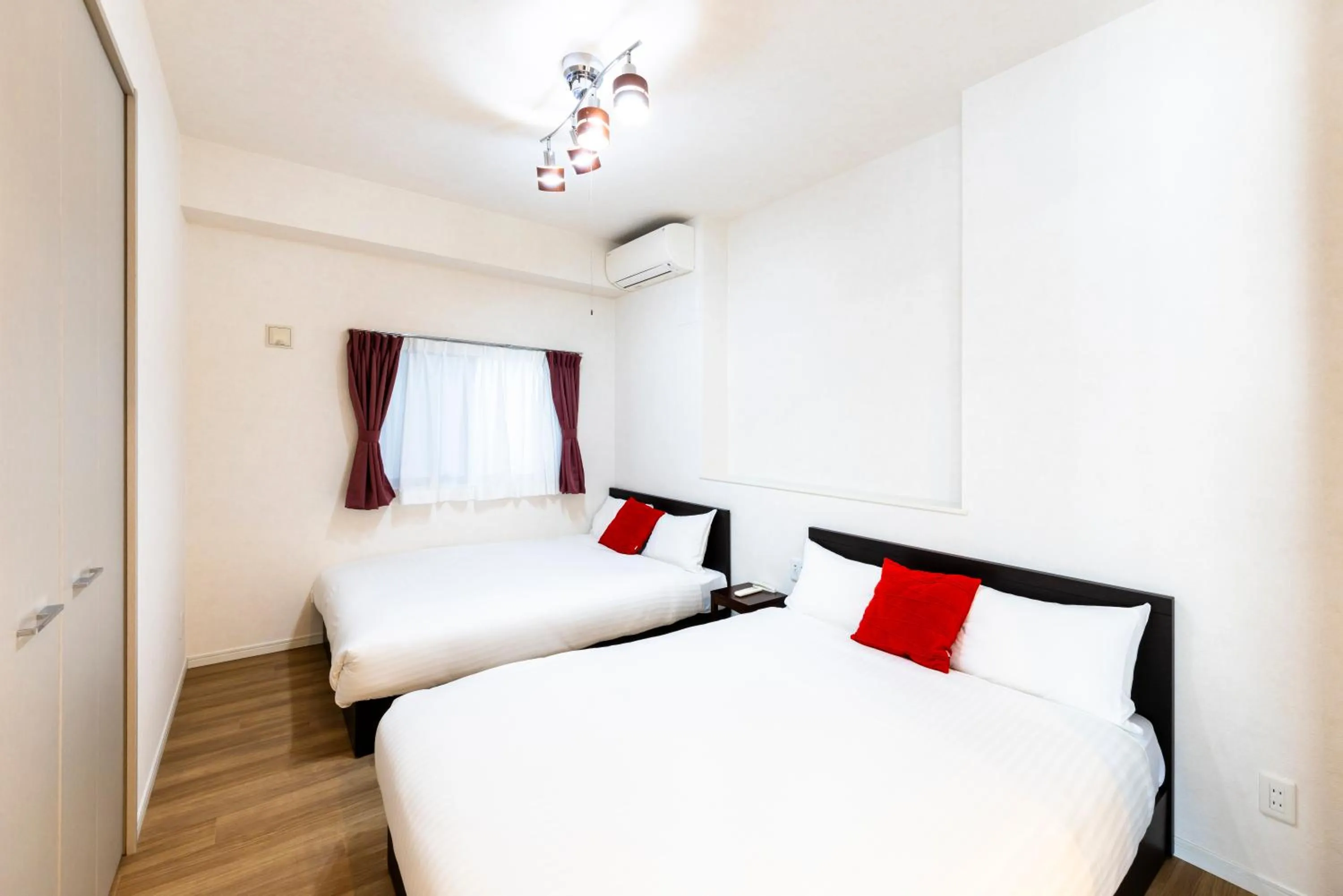 Bed in Riverside Inn Hakata