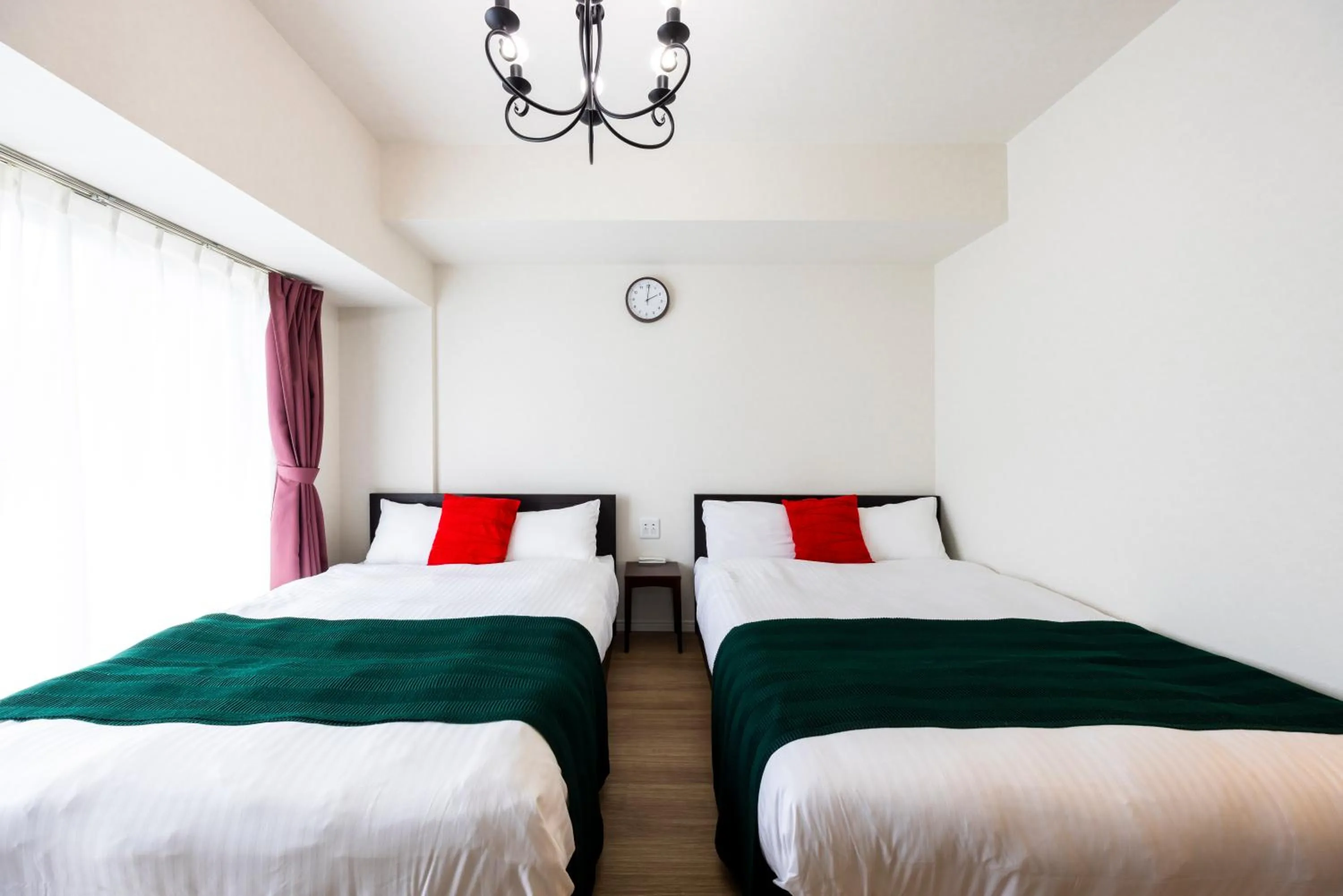 Bed in Riverside Inn Hakata