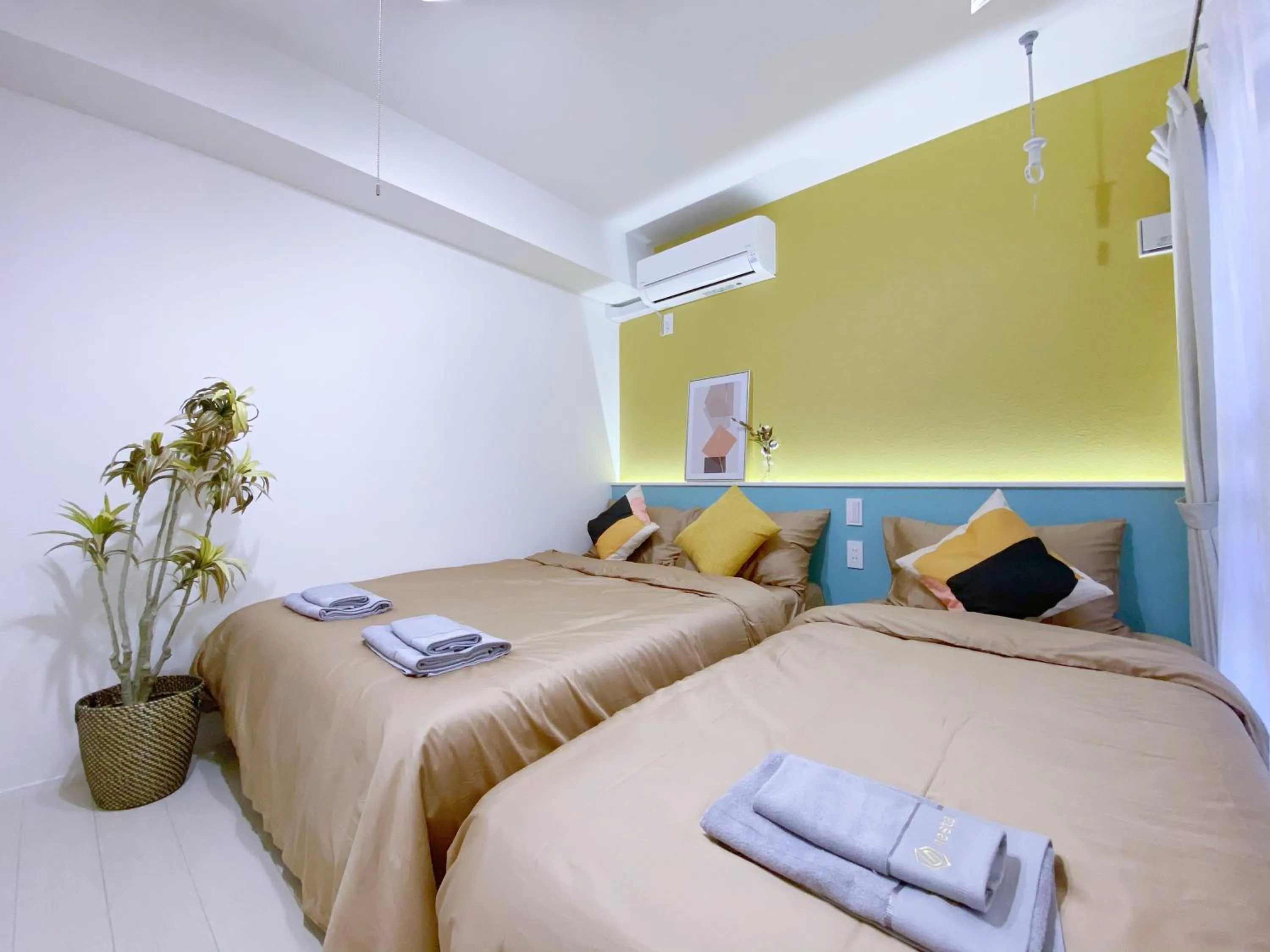 Bed in nestay apartment tokyo ginza