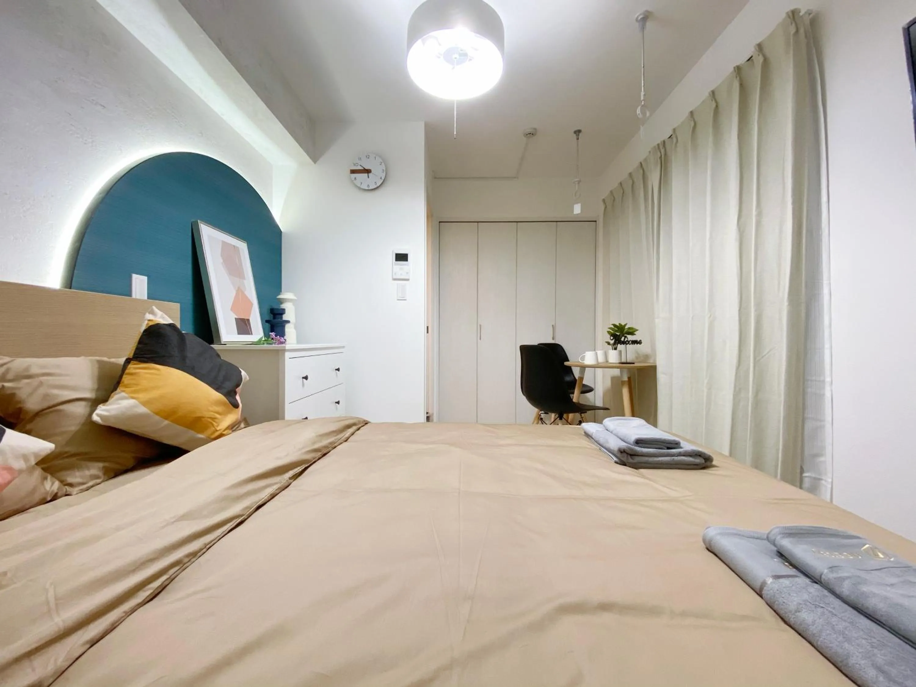 Bed in nestay apartment tokyo ginza