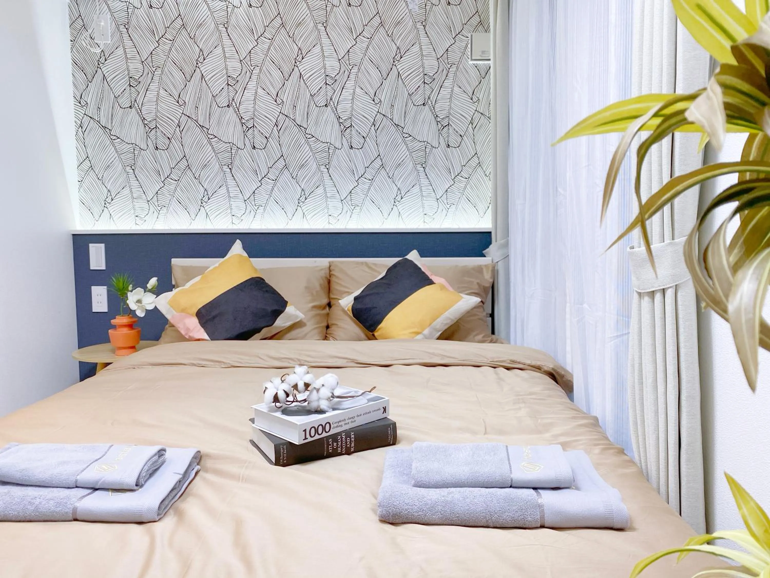 Bed in nestay apartment tokyo ginza