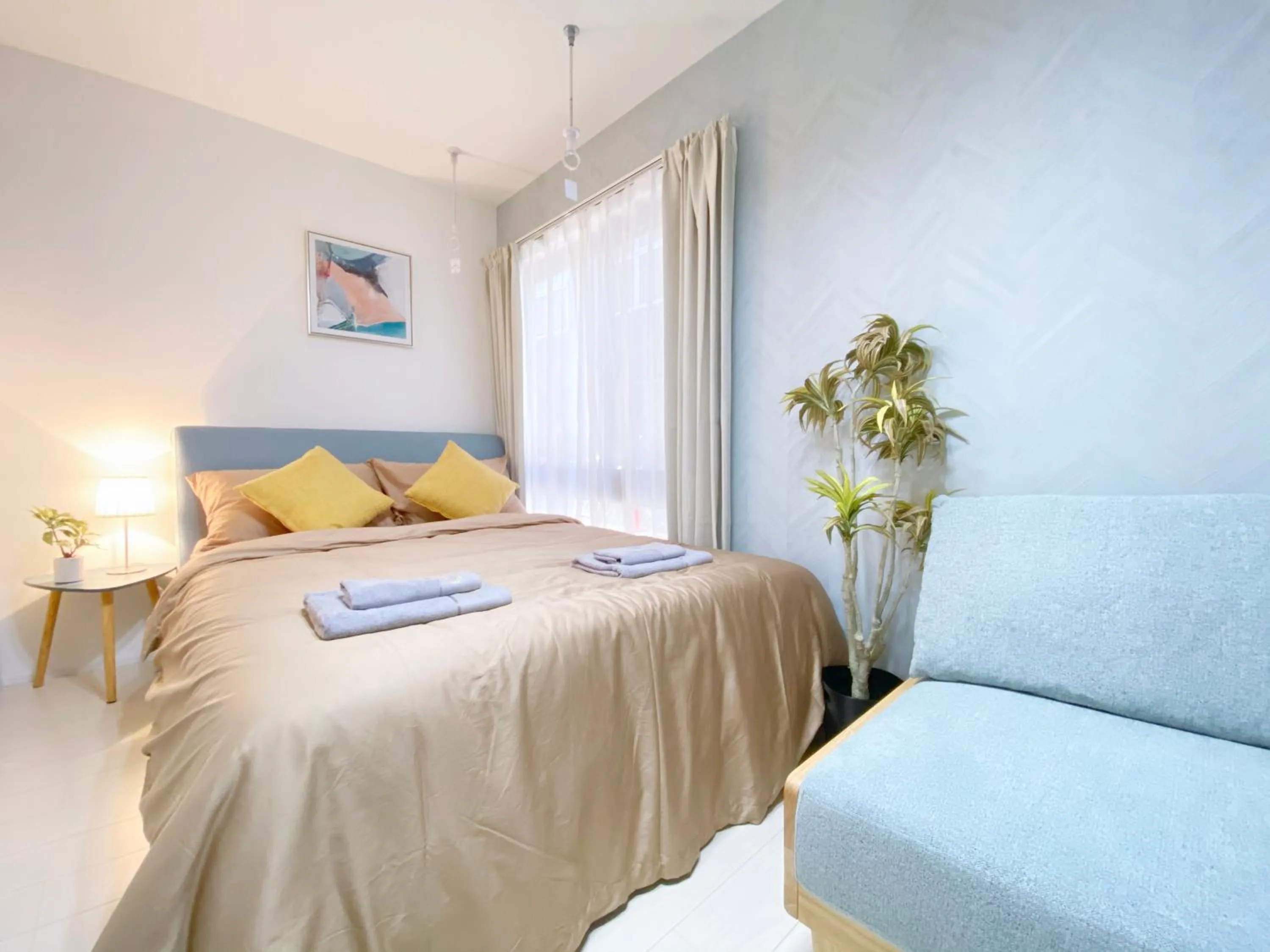 Bed in nestay apartment tokyo ginza