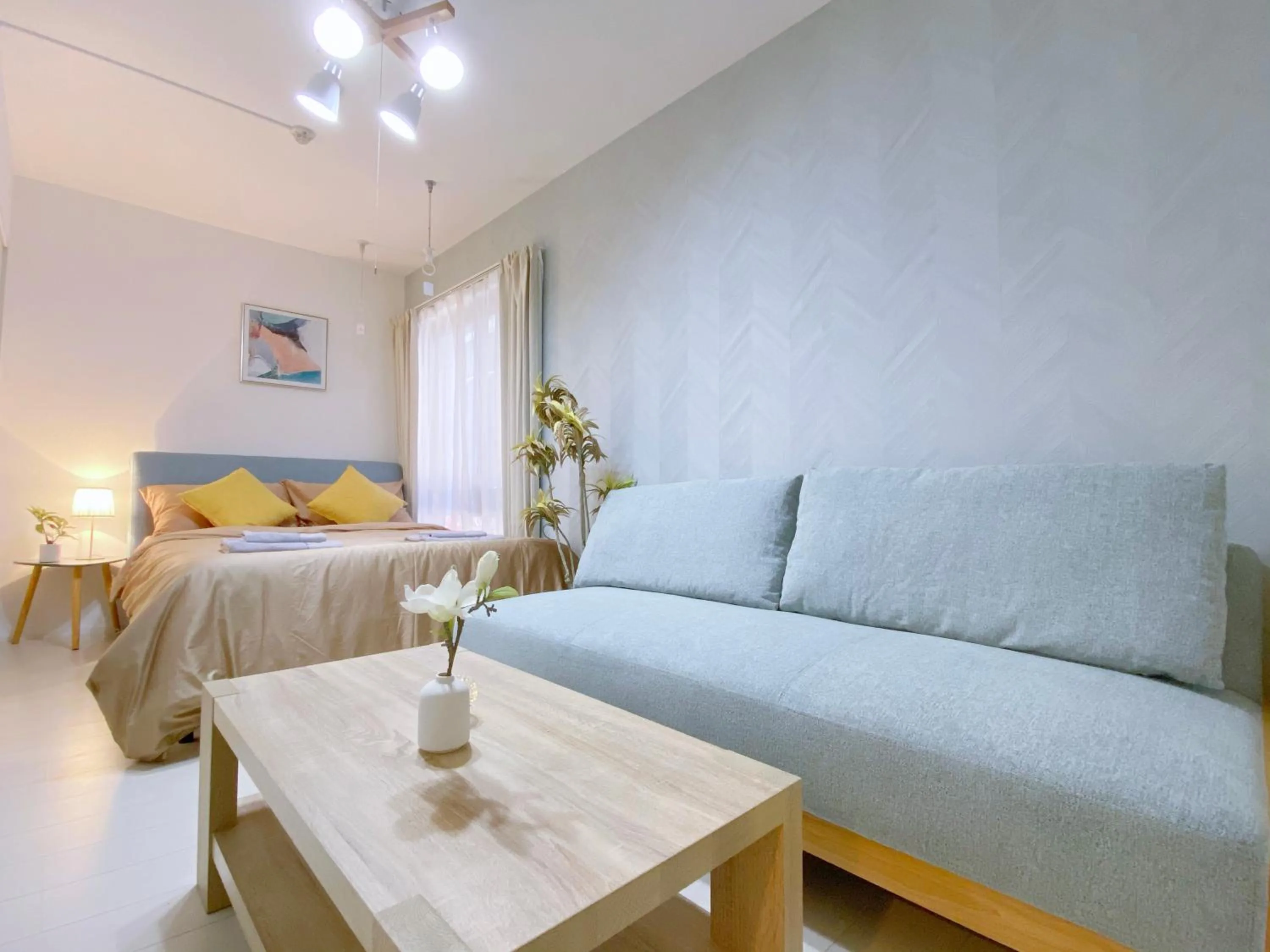 Bed in nestay apartment tokyo ginza
