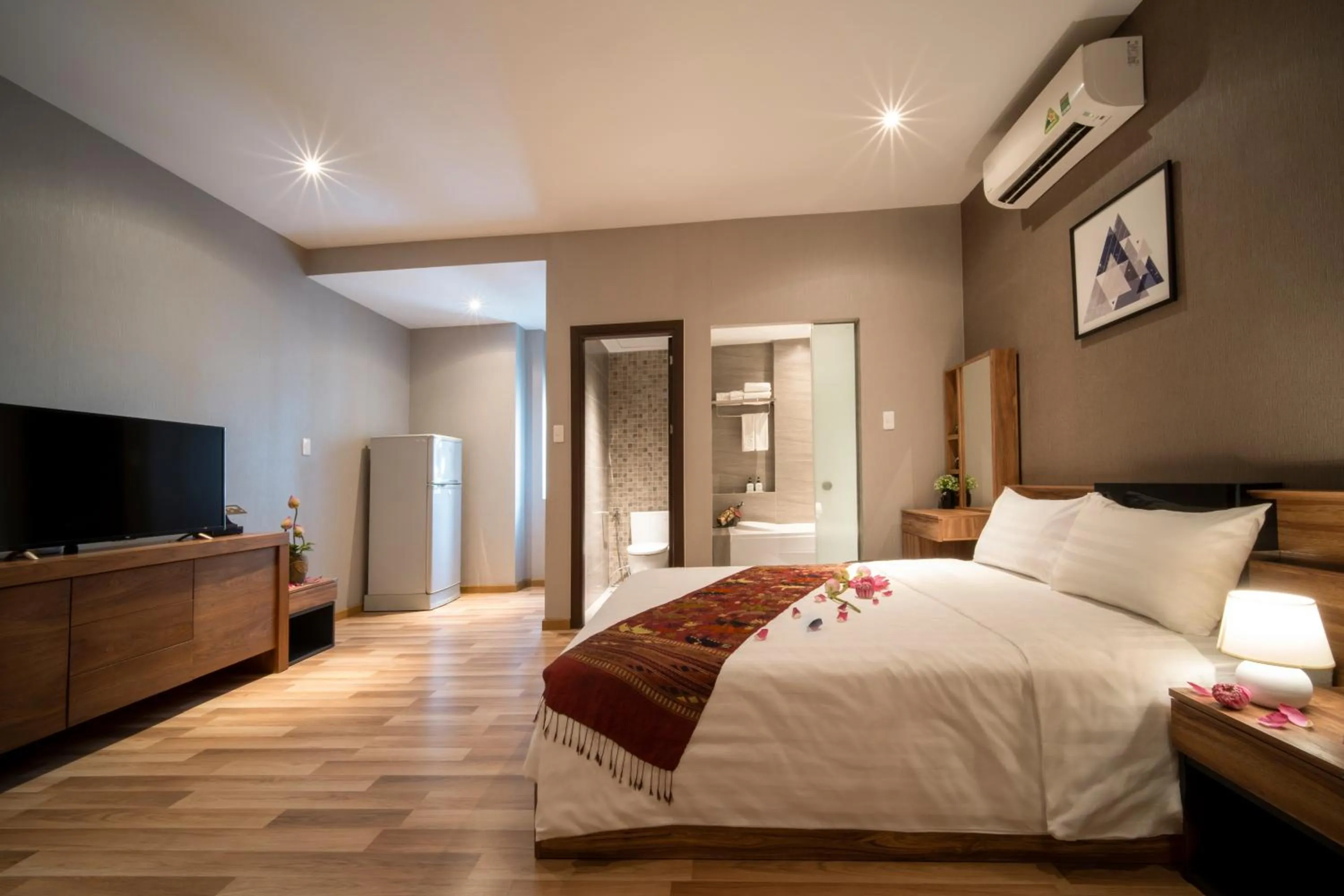 Bed in Sen Spa Service Apartment