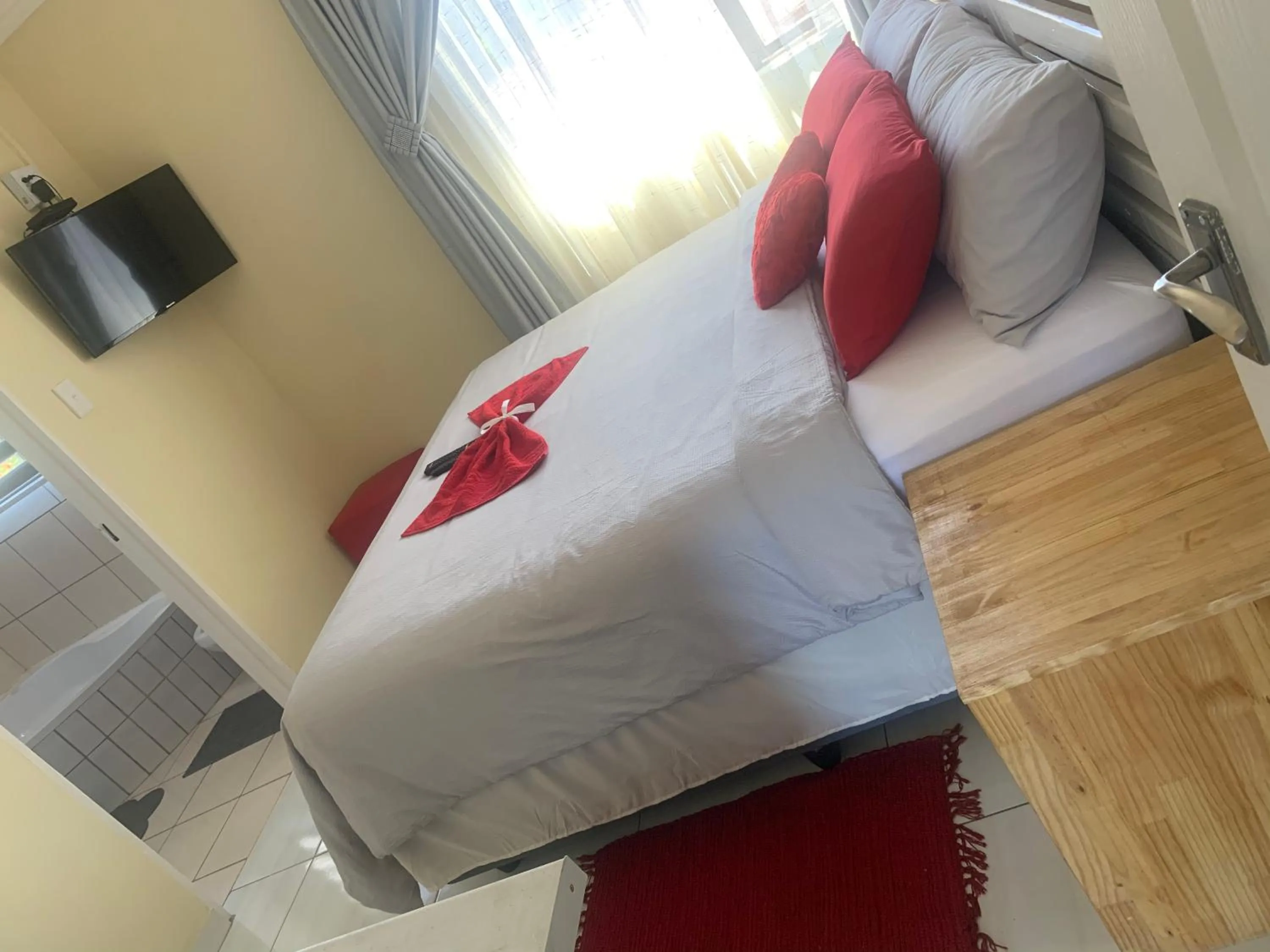 Bed in Ekaya Palace Guest House