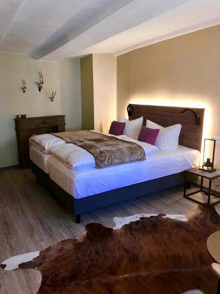 Bed in Romantisches Hotel Menzhausen
