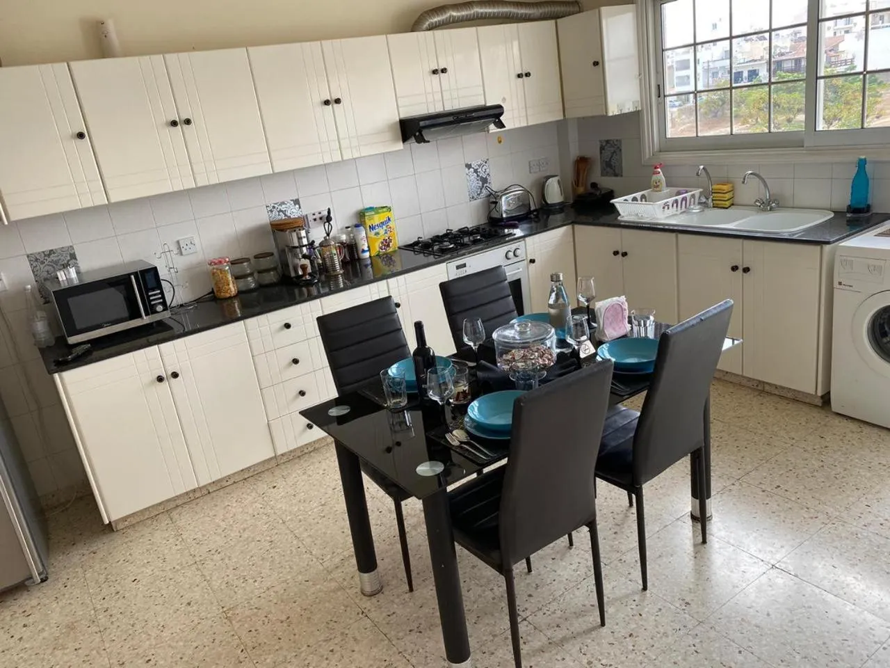 Kitchen or kitchenette in Larnaca Comfort Rooms With Smart TV & Netflix