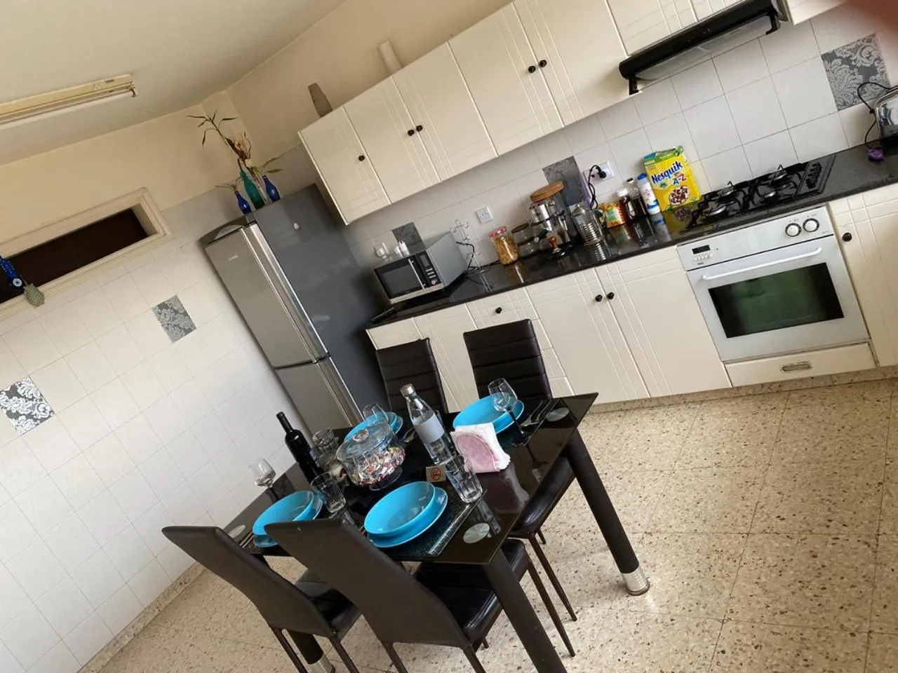 Kitchen or kitchenette in Larnaca Comfort Rooms With Smart TV & Netflix