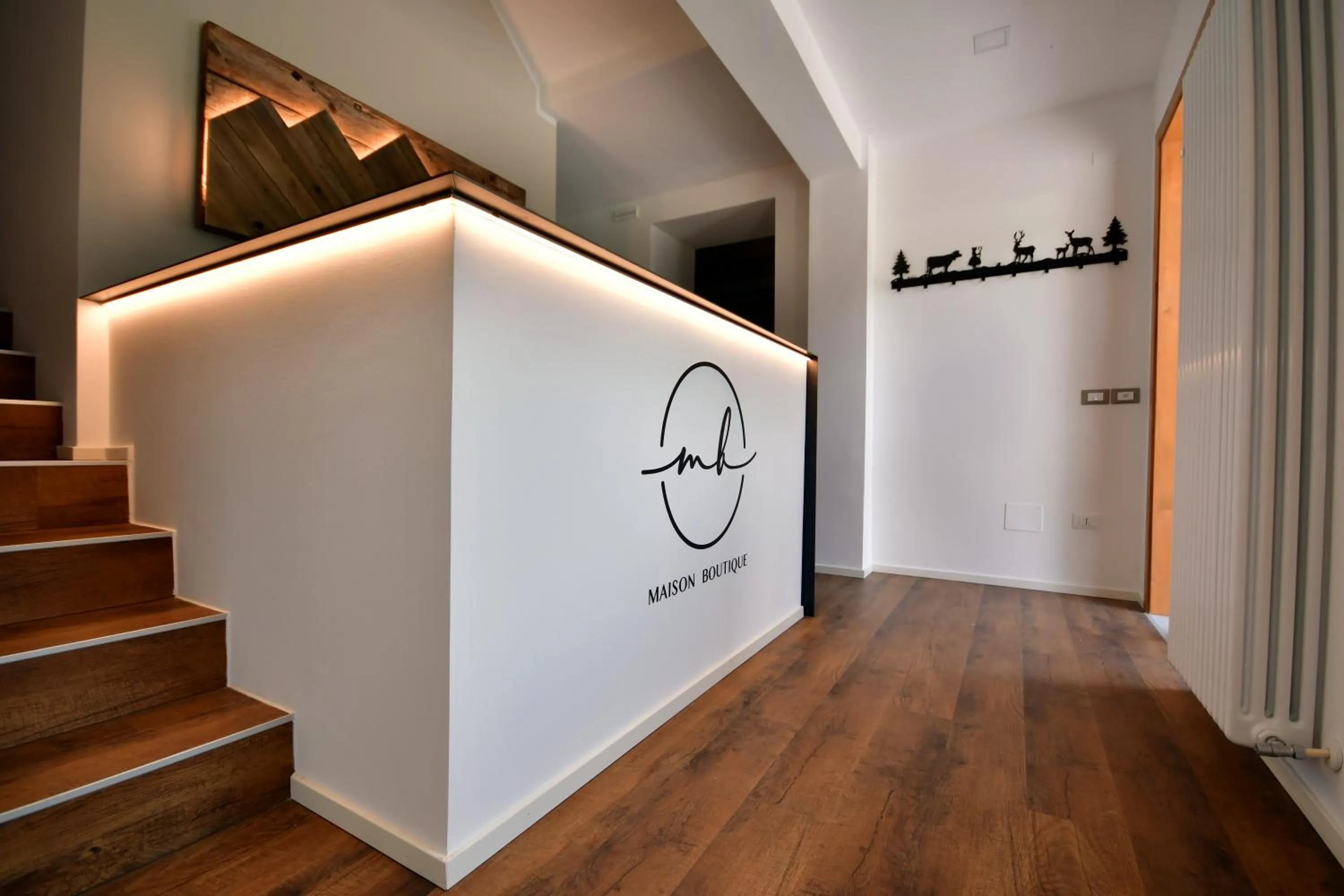 Lobby or reception in Maison Boutique Fior d'Alpe