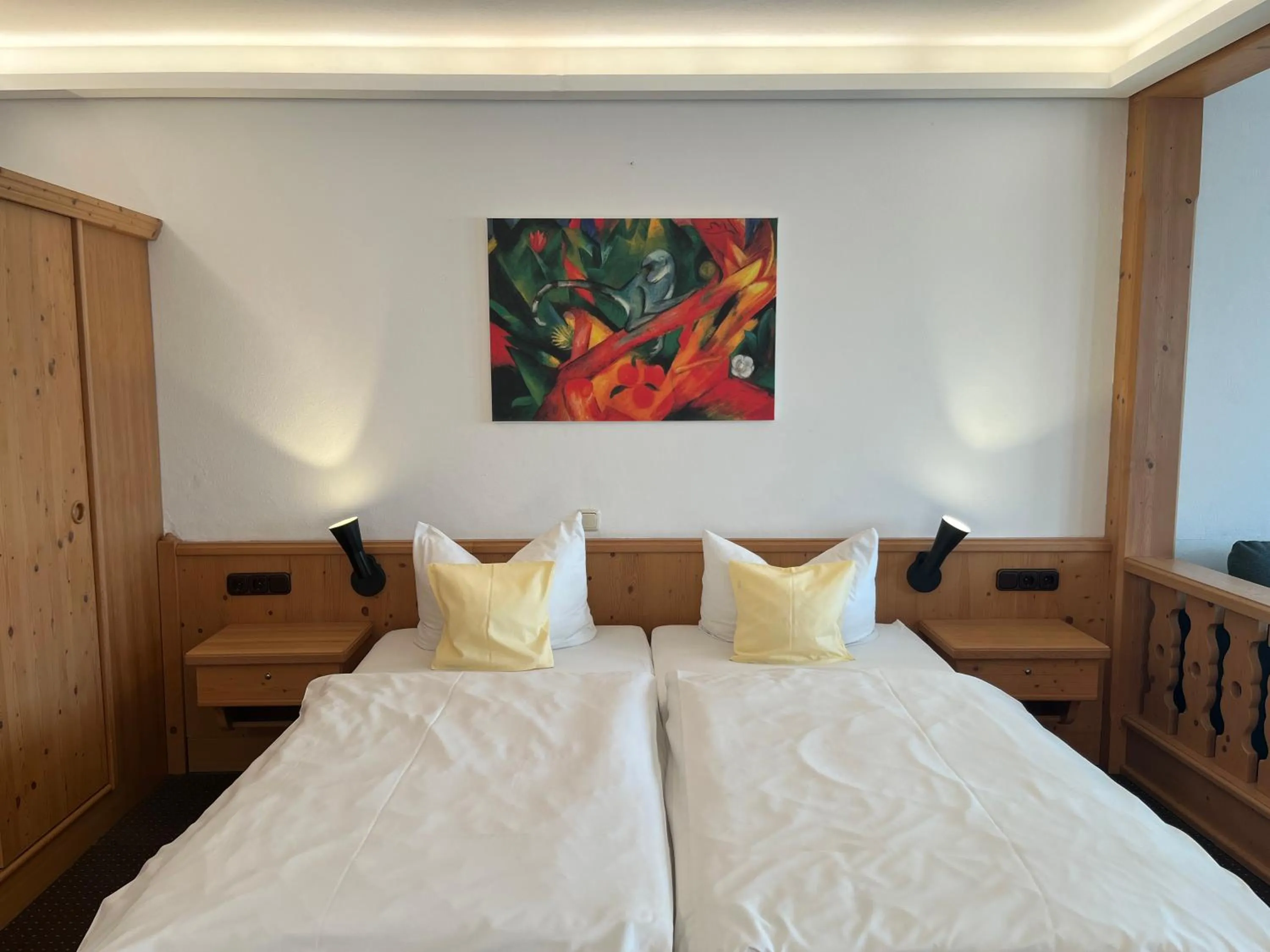 Photo of the whole room, Bed in Seehotel Grauer Bär