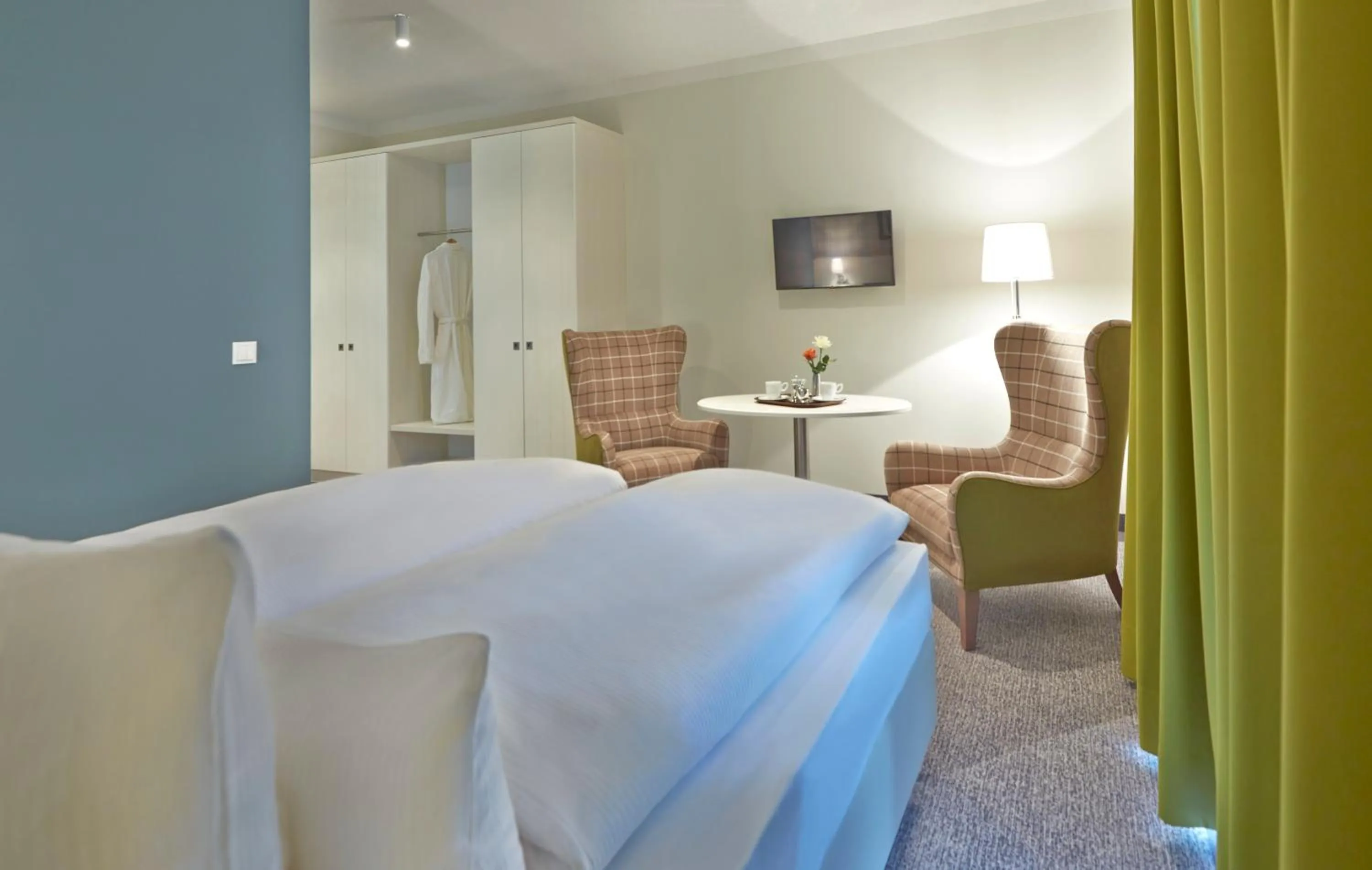 Living room, Bed in Dorint Resort Baltic Hills Usedom