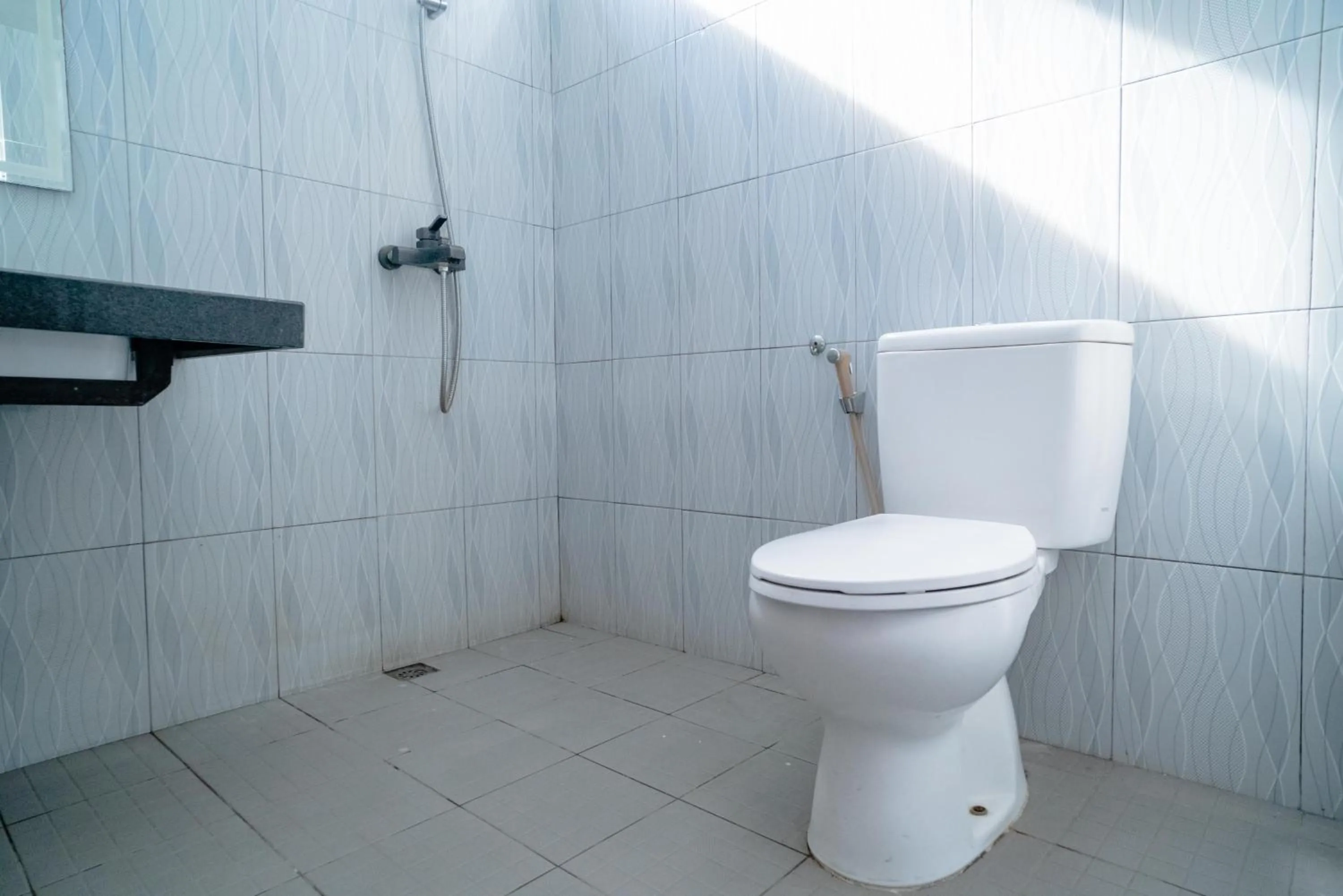 Bathroom in RedDoorz @ Jalan Pendidikan Mataram