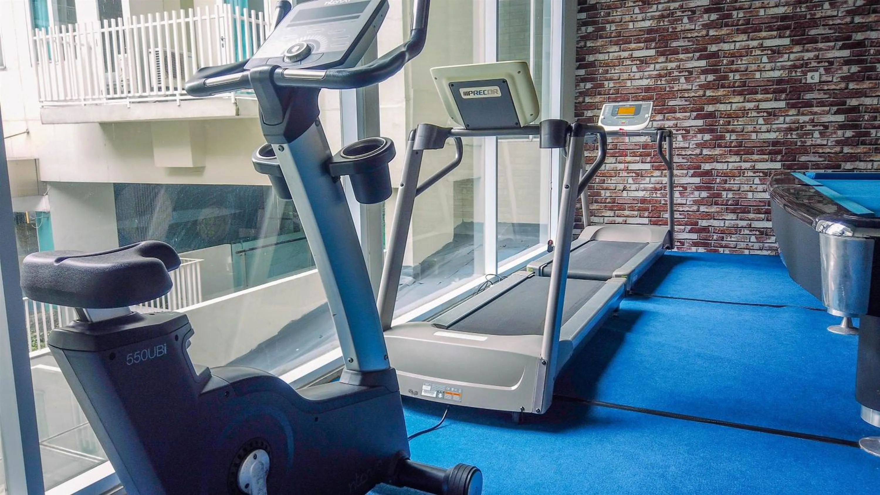Fitness centre/facilities in Minimalist Studio at 11st Floor Bogor Icon Apartment By Travelio