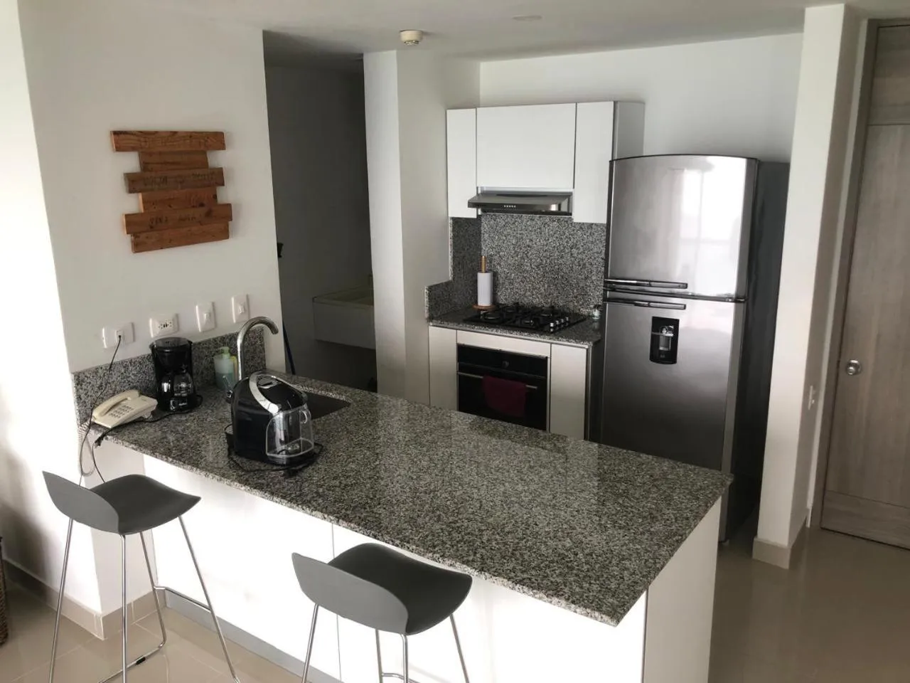 Kitchen or kitchenette in Apartamentos frente al mar en Morros City