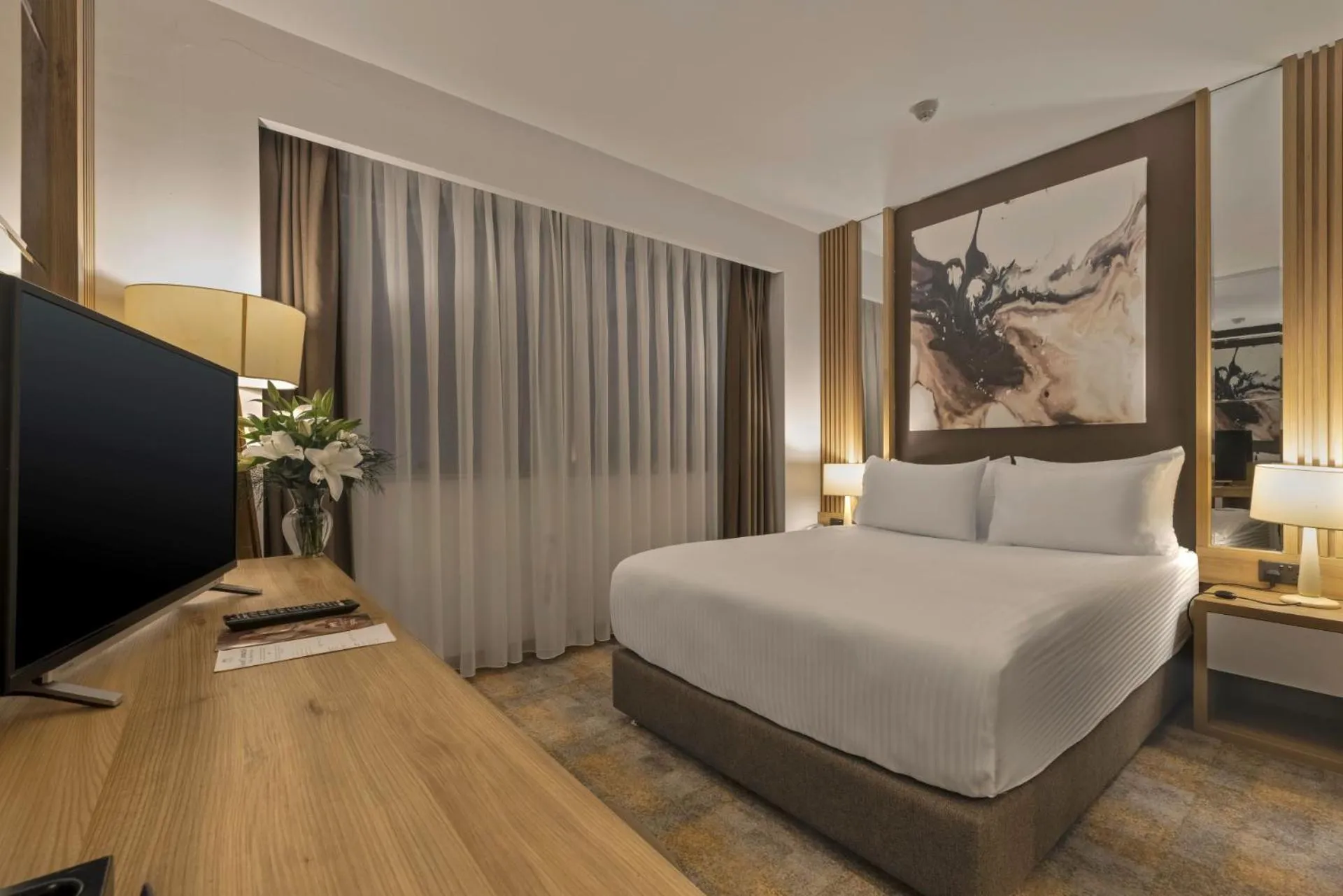 Bed in Grand Sapphire City Hotel