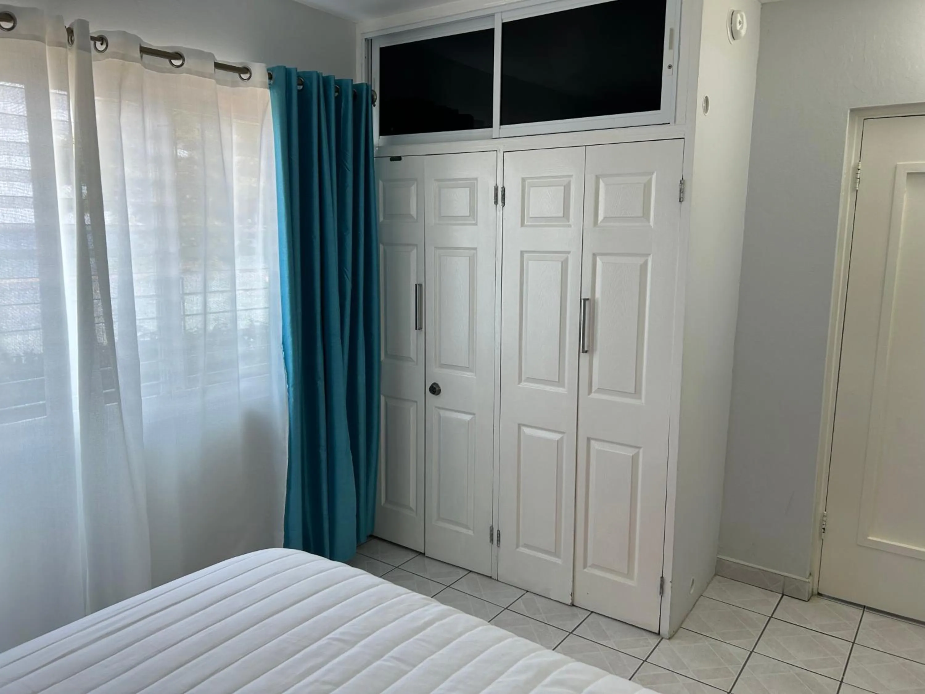 Bedroom, Bed in Contemporary Ocean view 2bed Carib Ocho Rios Condo