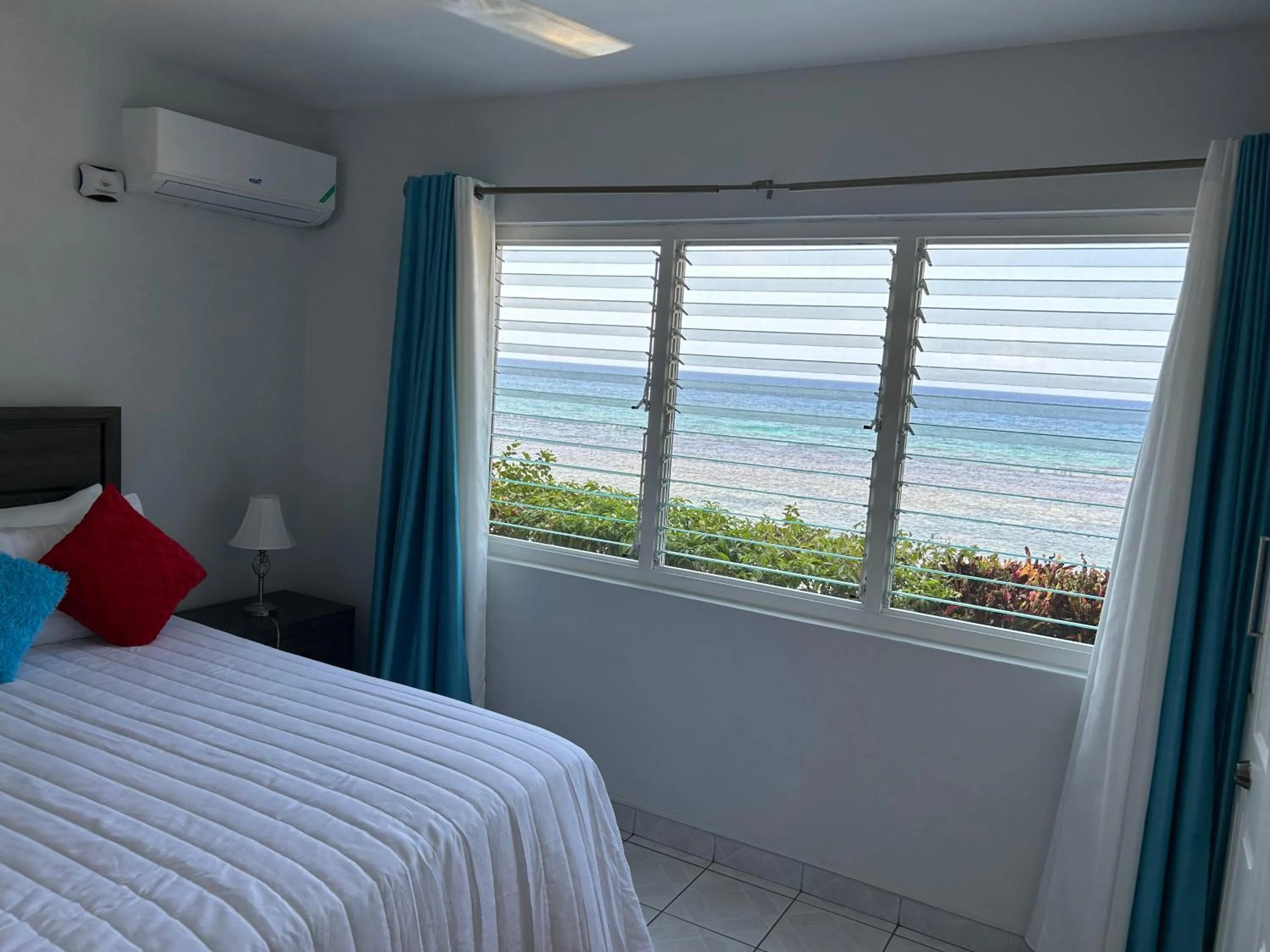 Bedroom, Bed in Contemporary Ocean view 2bed Carib Ocho Rios Condo