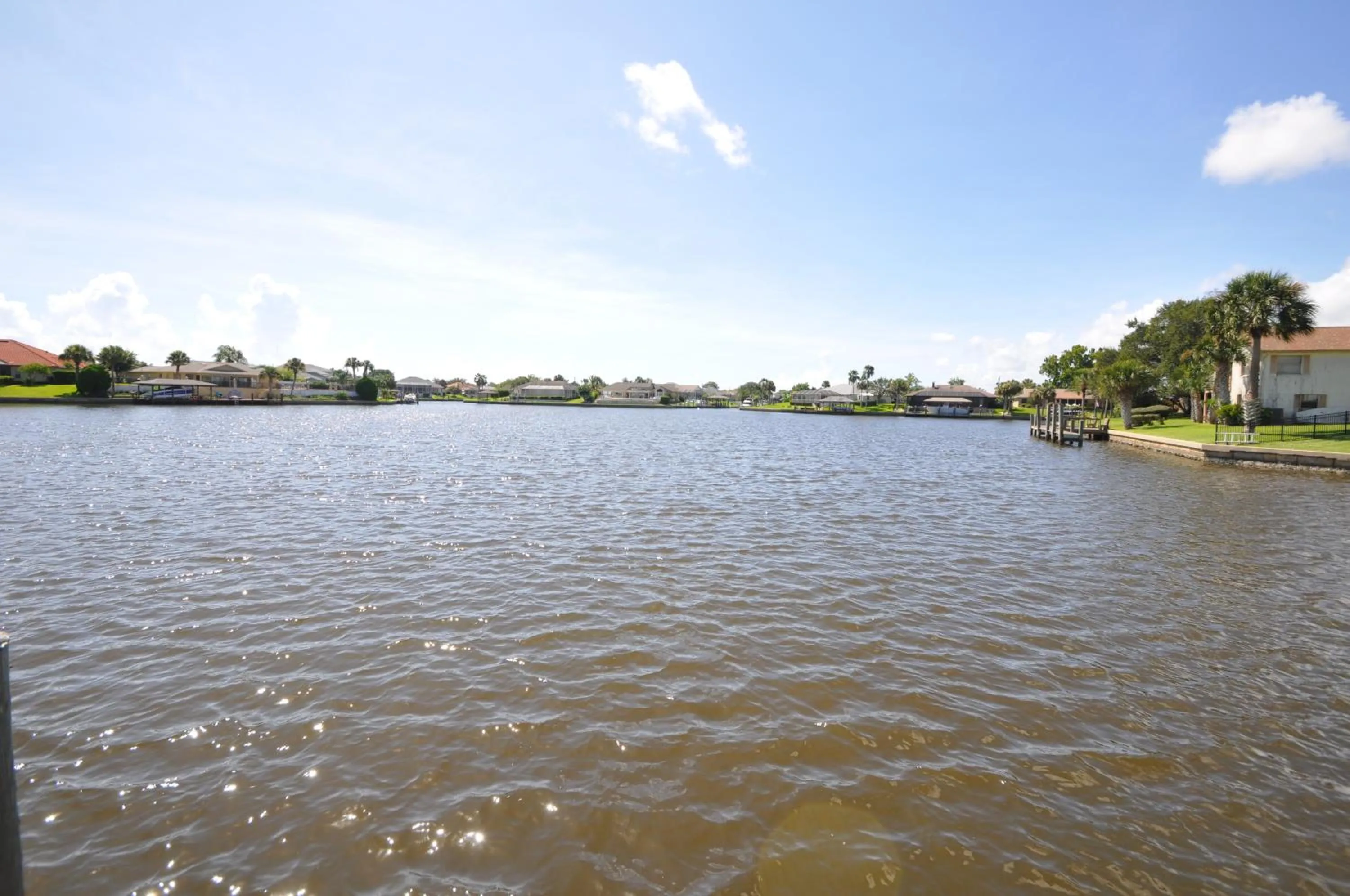 Sunset Bay Beautiful Pool Home - Bring Your Boat or Jet Ski - Canal with Dock- Sleeps 10 - 4 BD