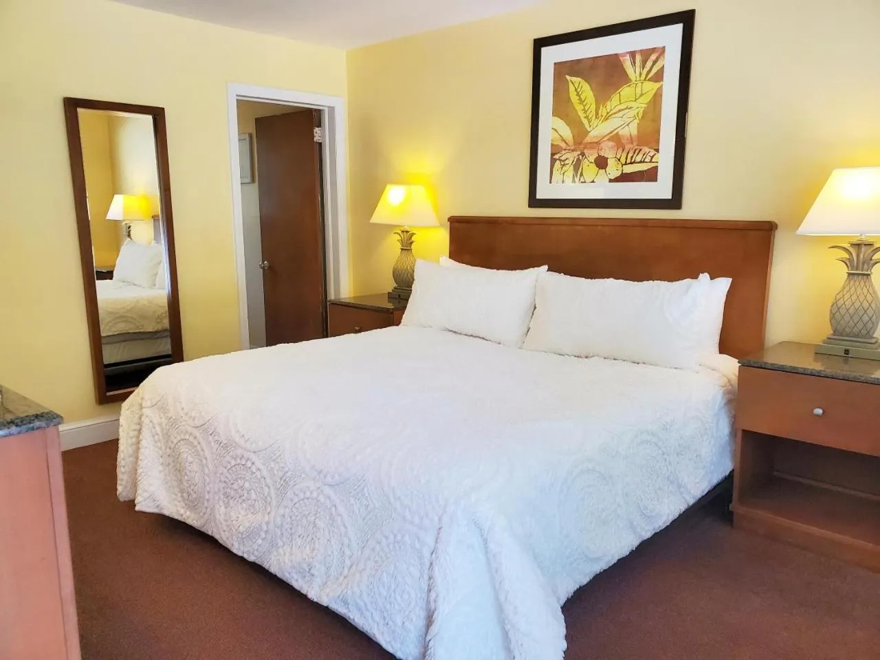 Bed in Geneva Hotel & Tiki Bar