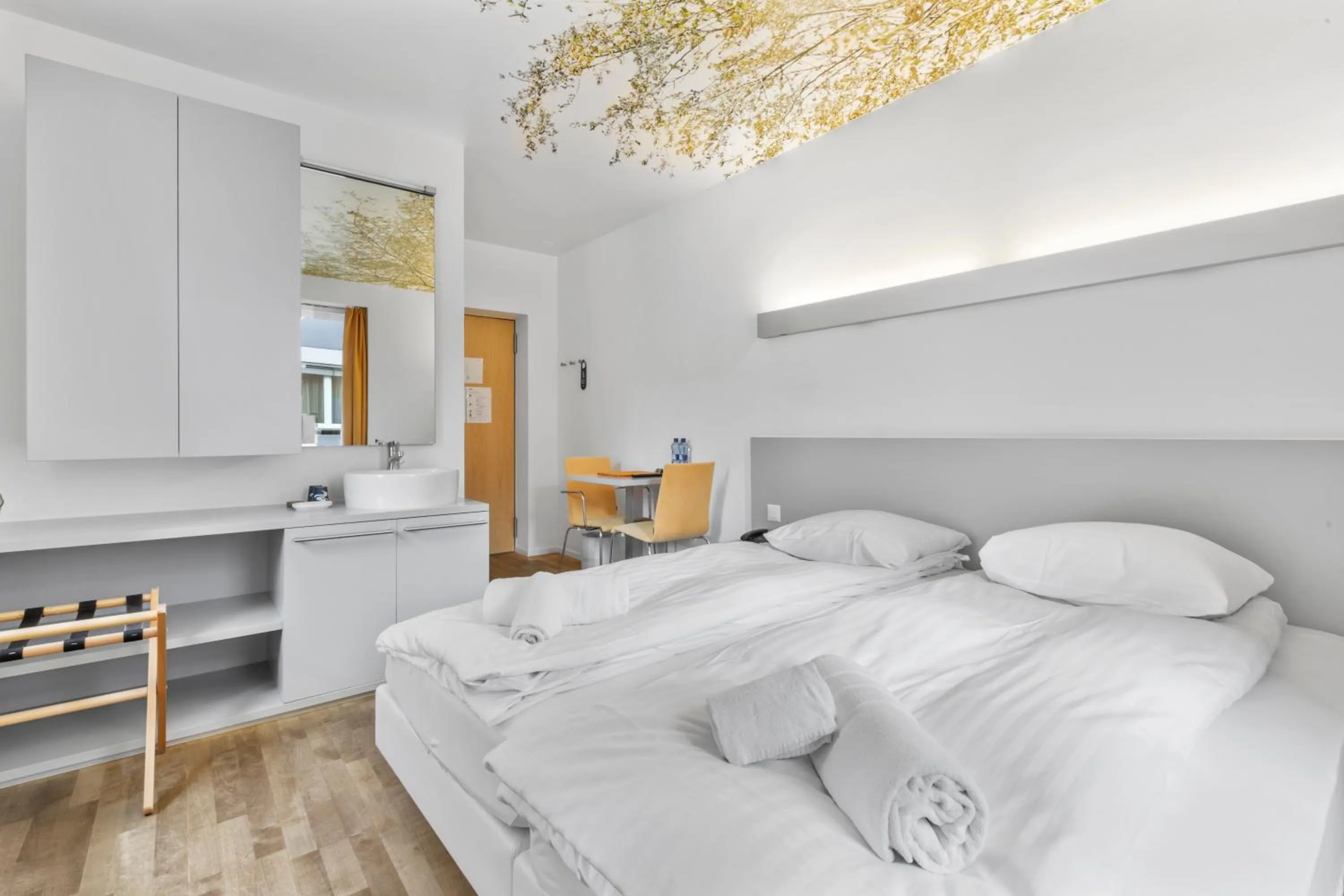 Bed in Hôtel de la Poste Sierre