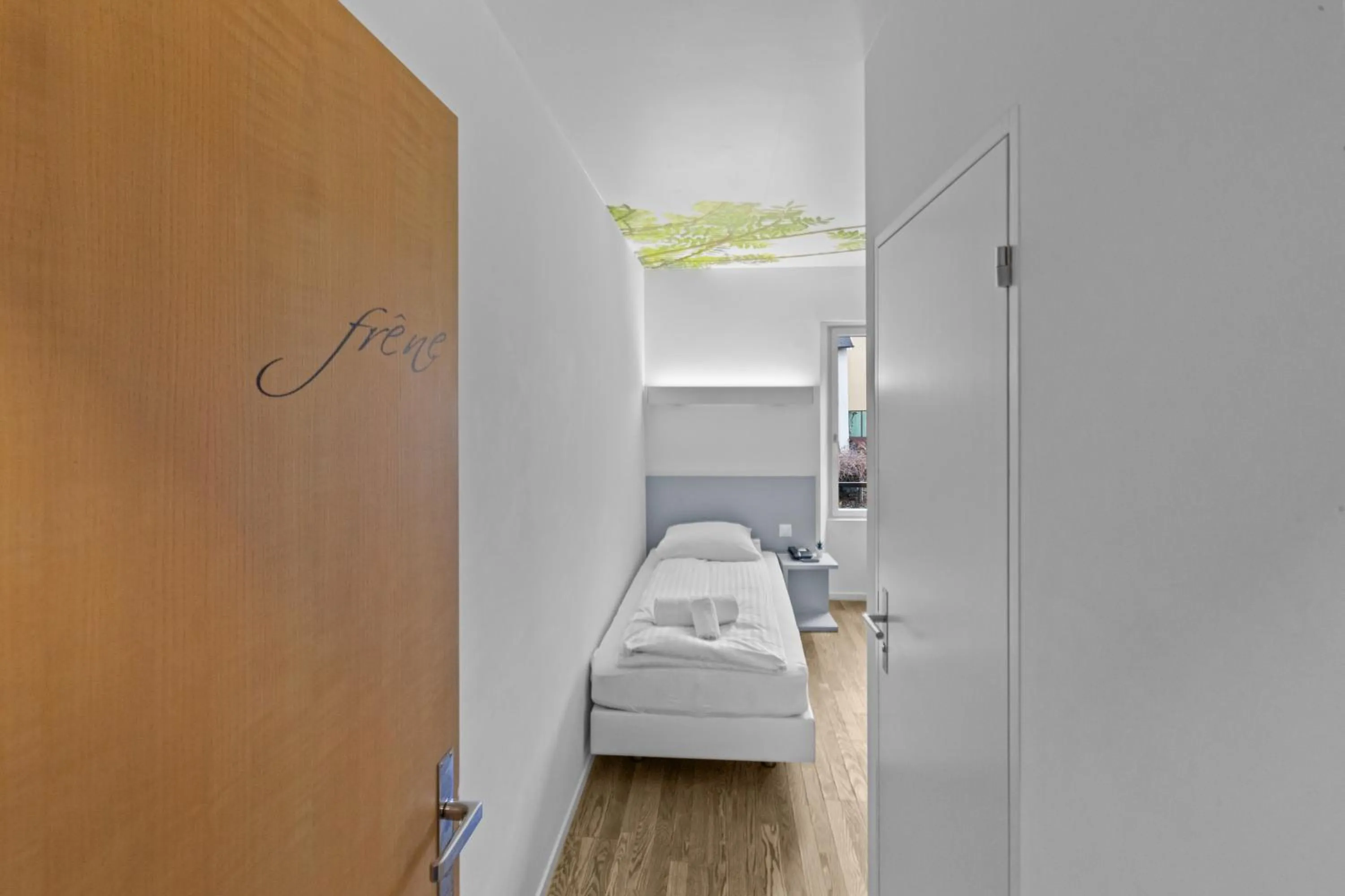 Bed in Hôtel de la Poste Sierre