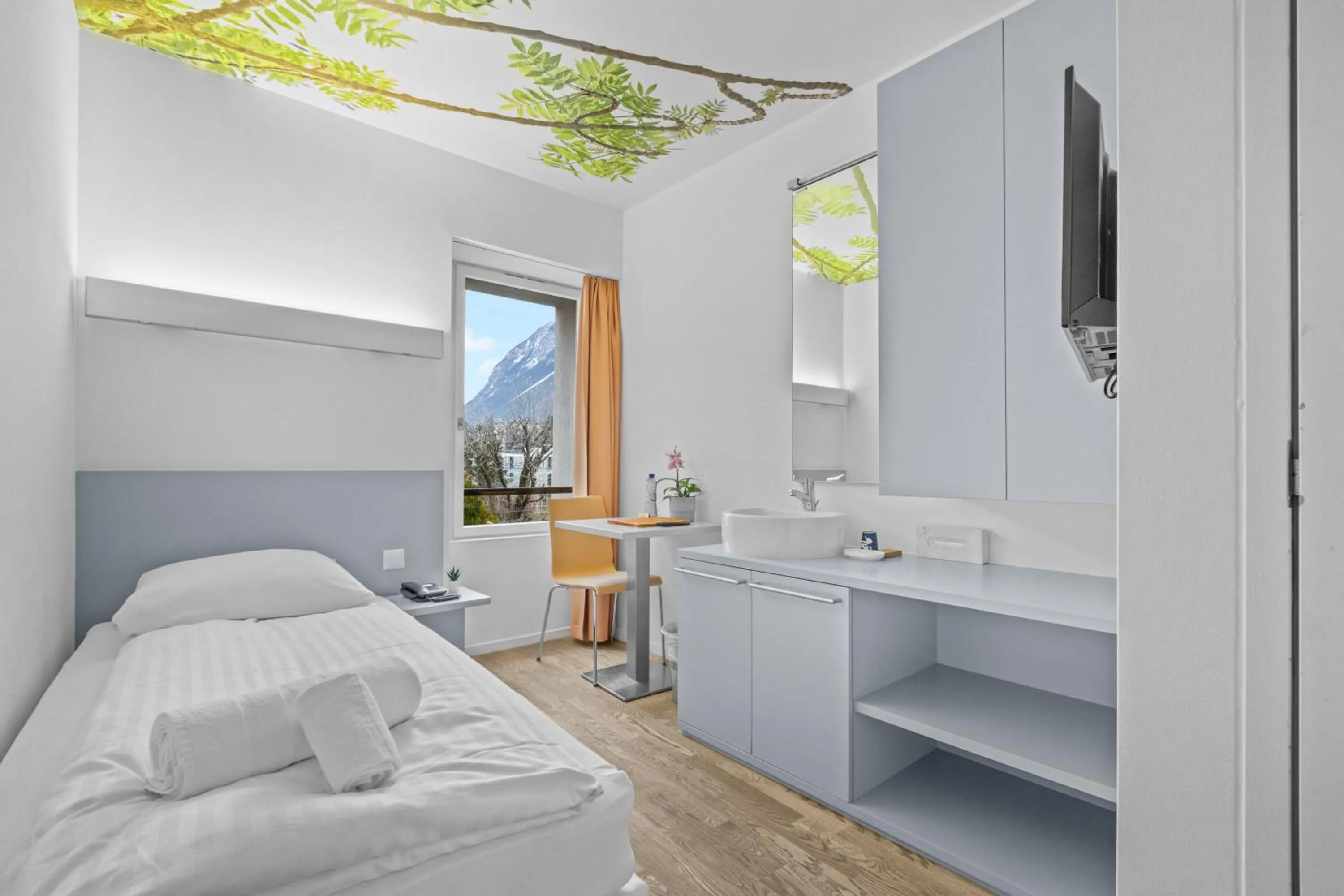 Bed in Hôtel de la Poste Sierre