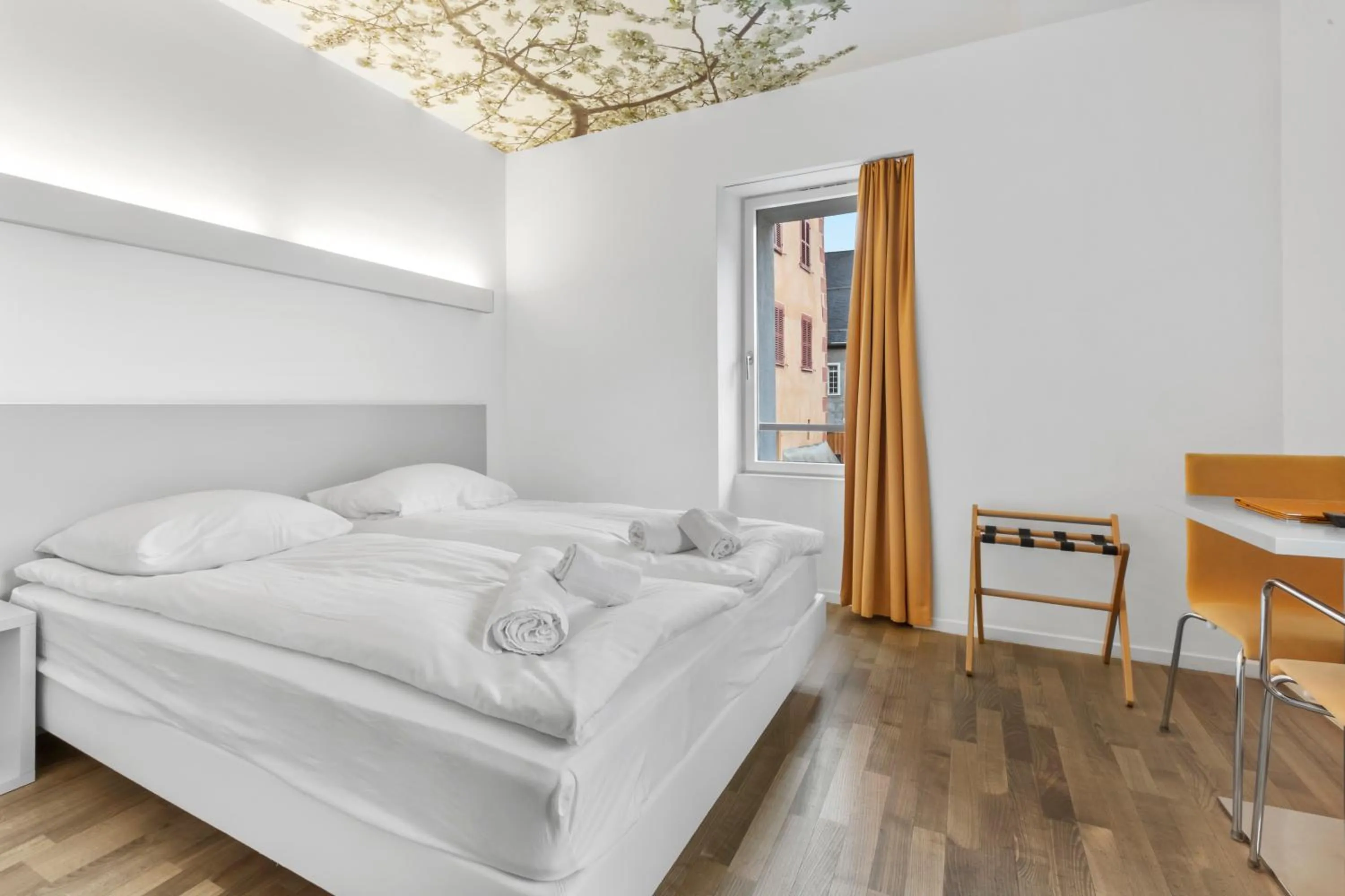 Bed in Hôtel de la Poste Sierre