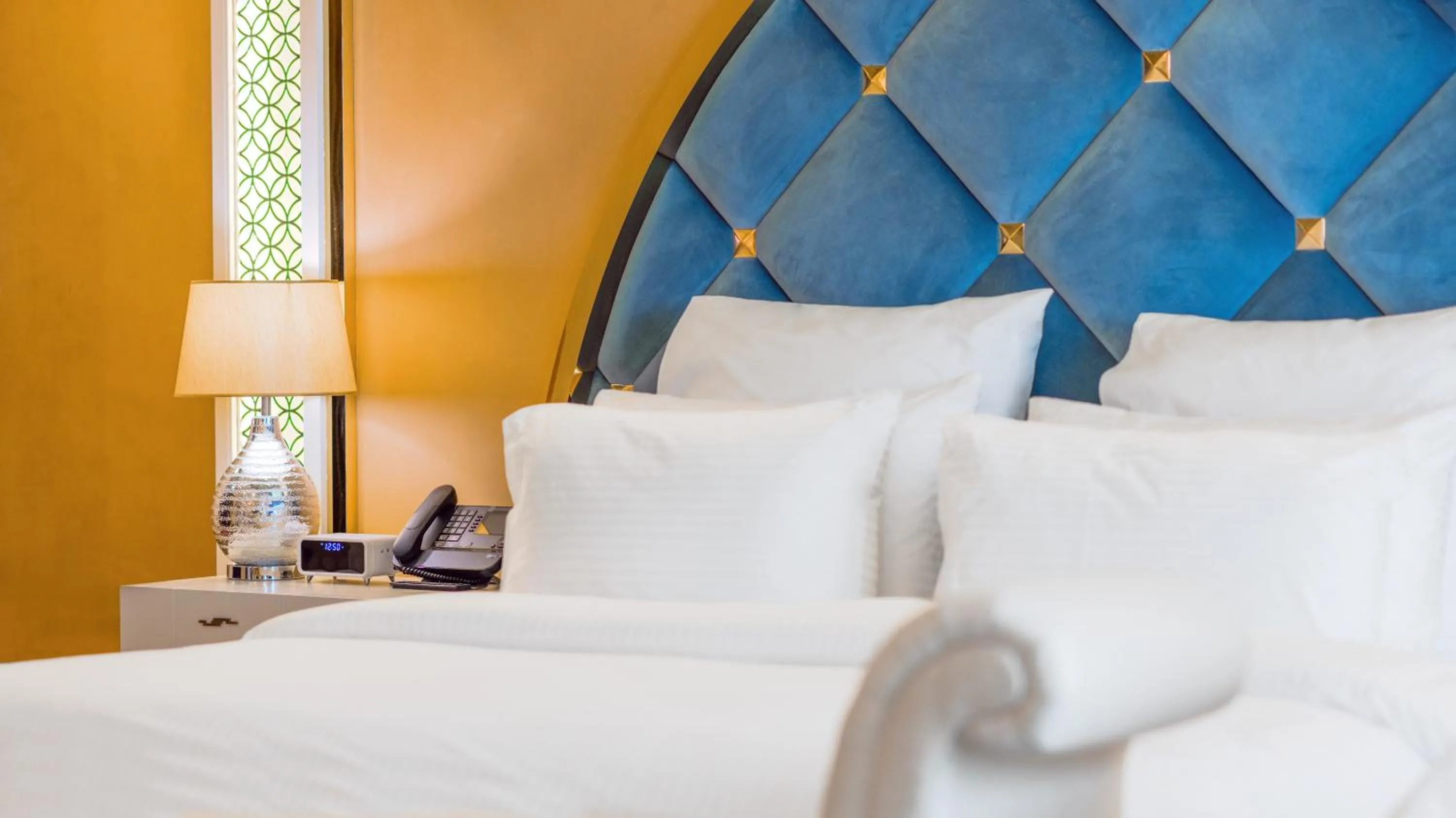 Bed in Grand Millennium Gizan