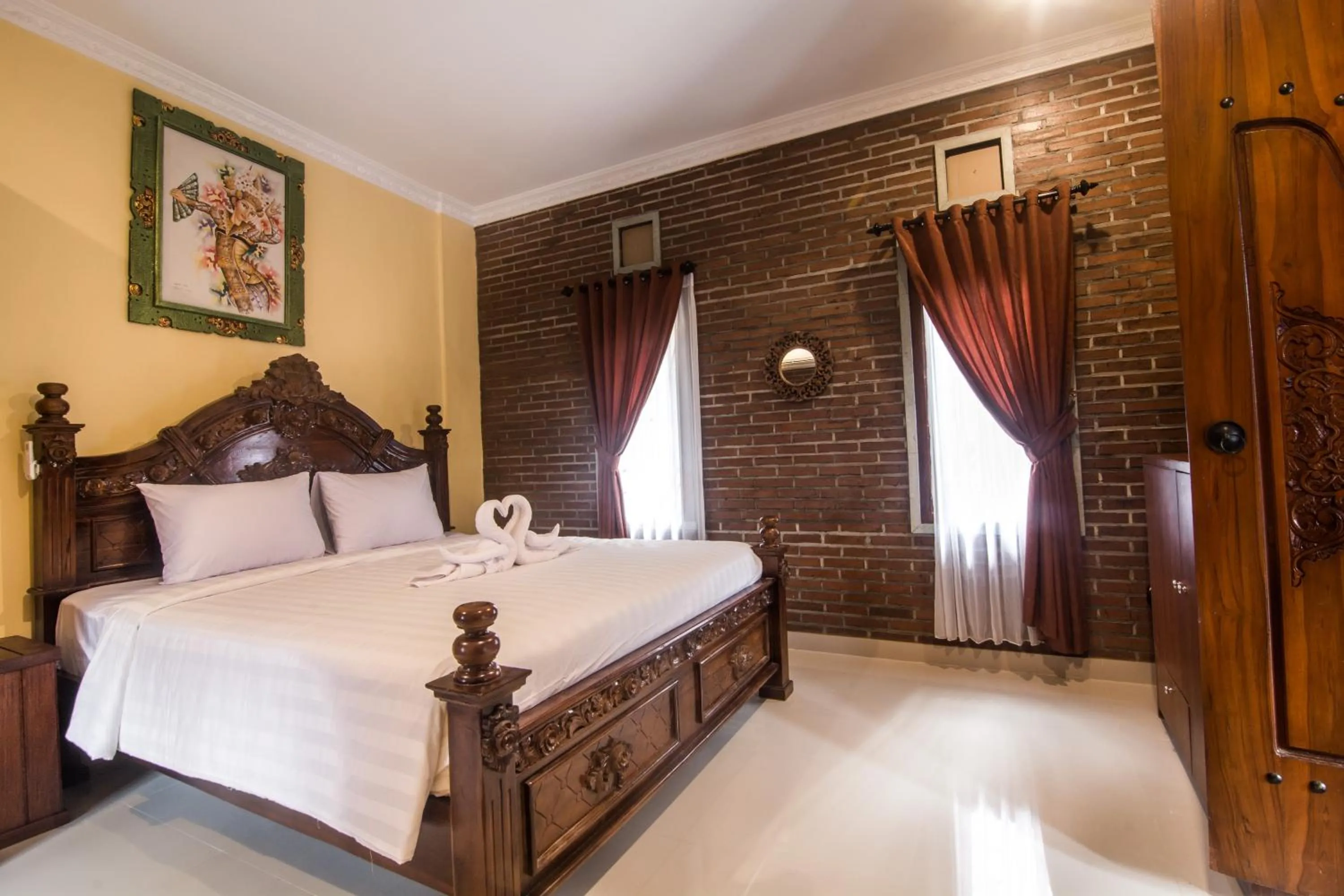 Bed in The Garuda Homestay Sanur