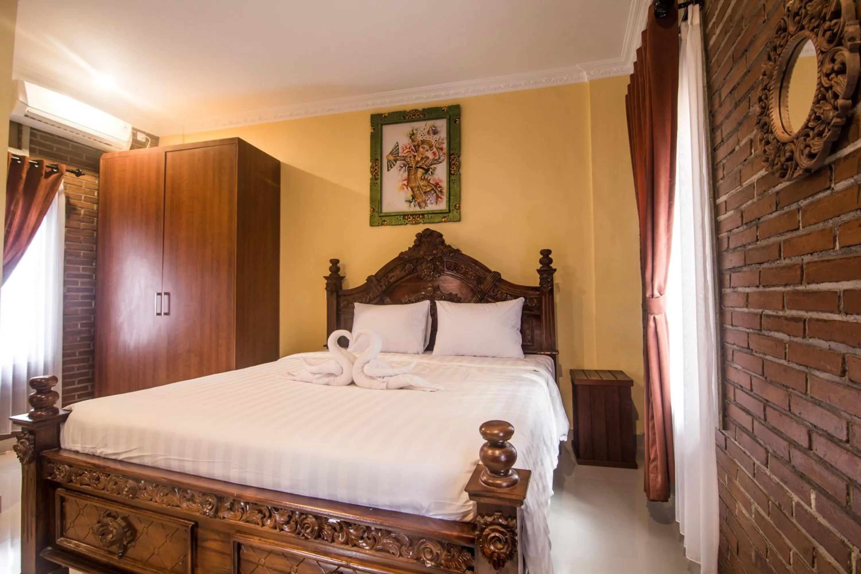 Bed in The Garuda Homestay Sanur