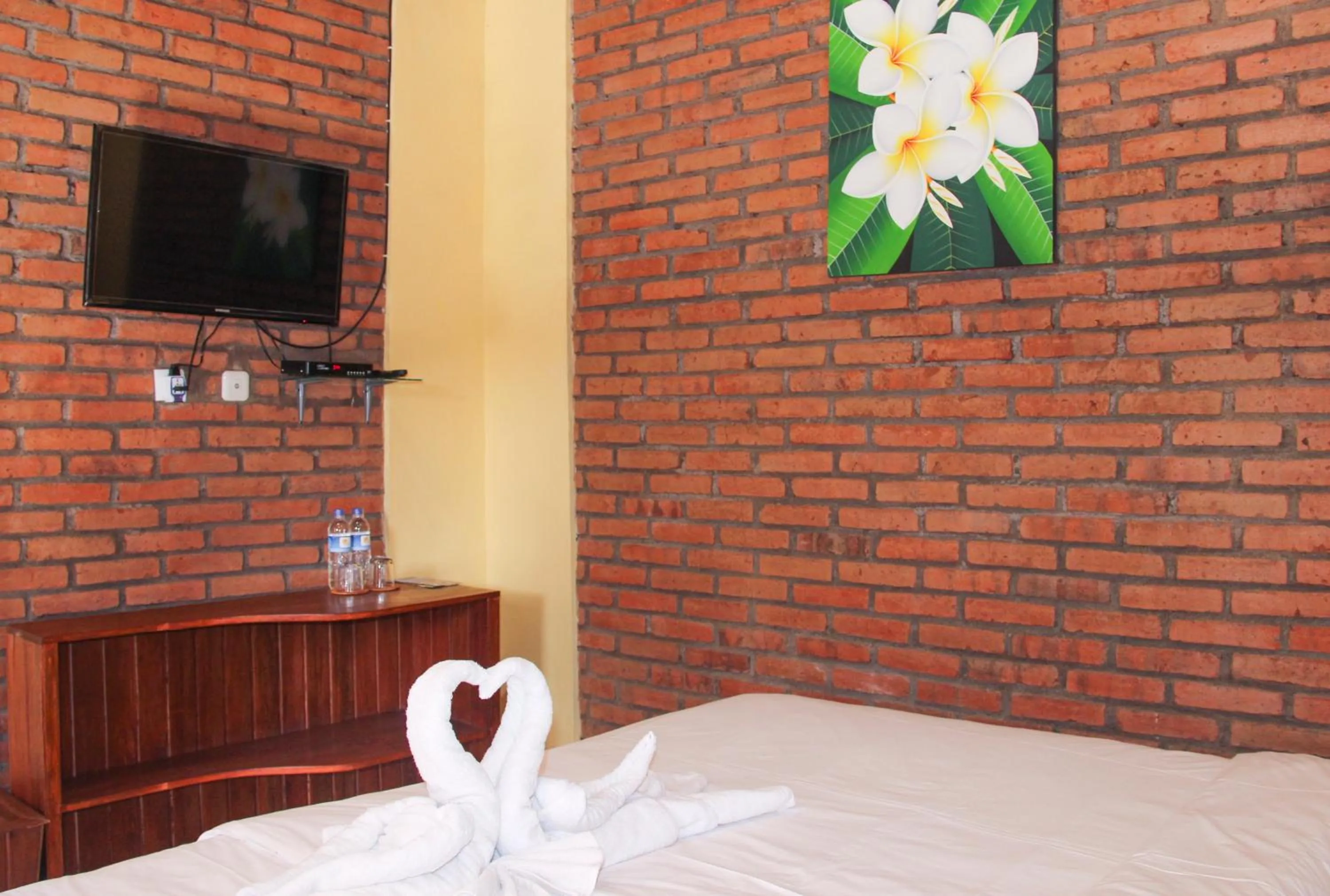Bed in The Garuda Homestay Sanur
