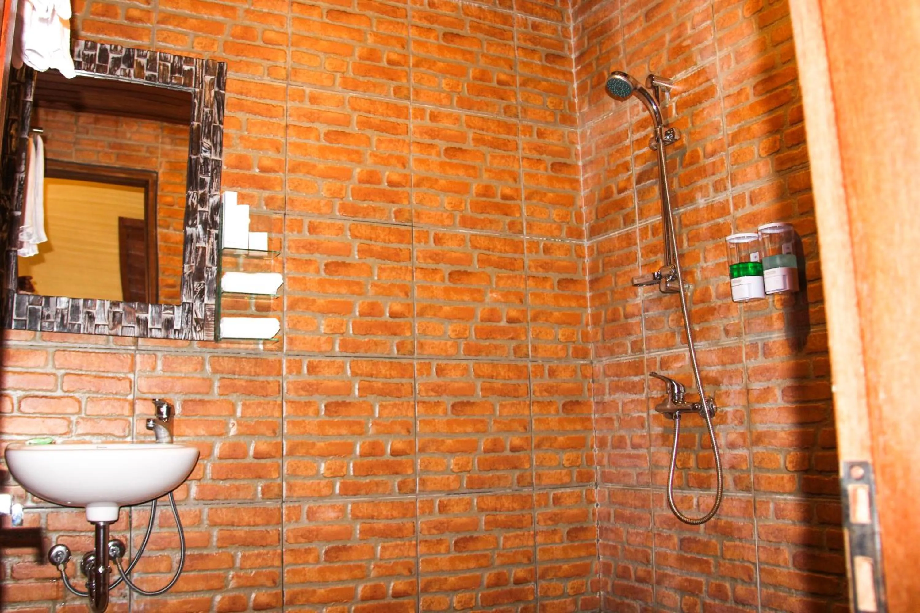 Bathroom in The Garuda Homestay Sanur